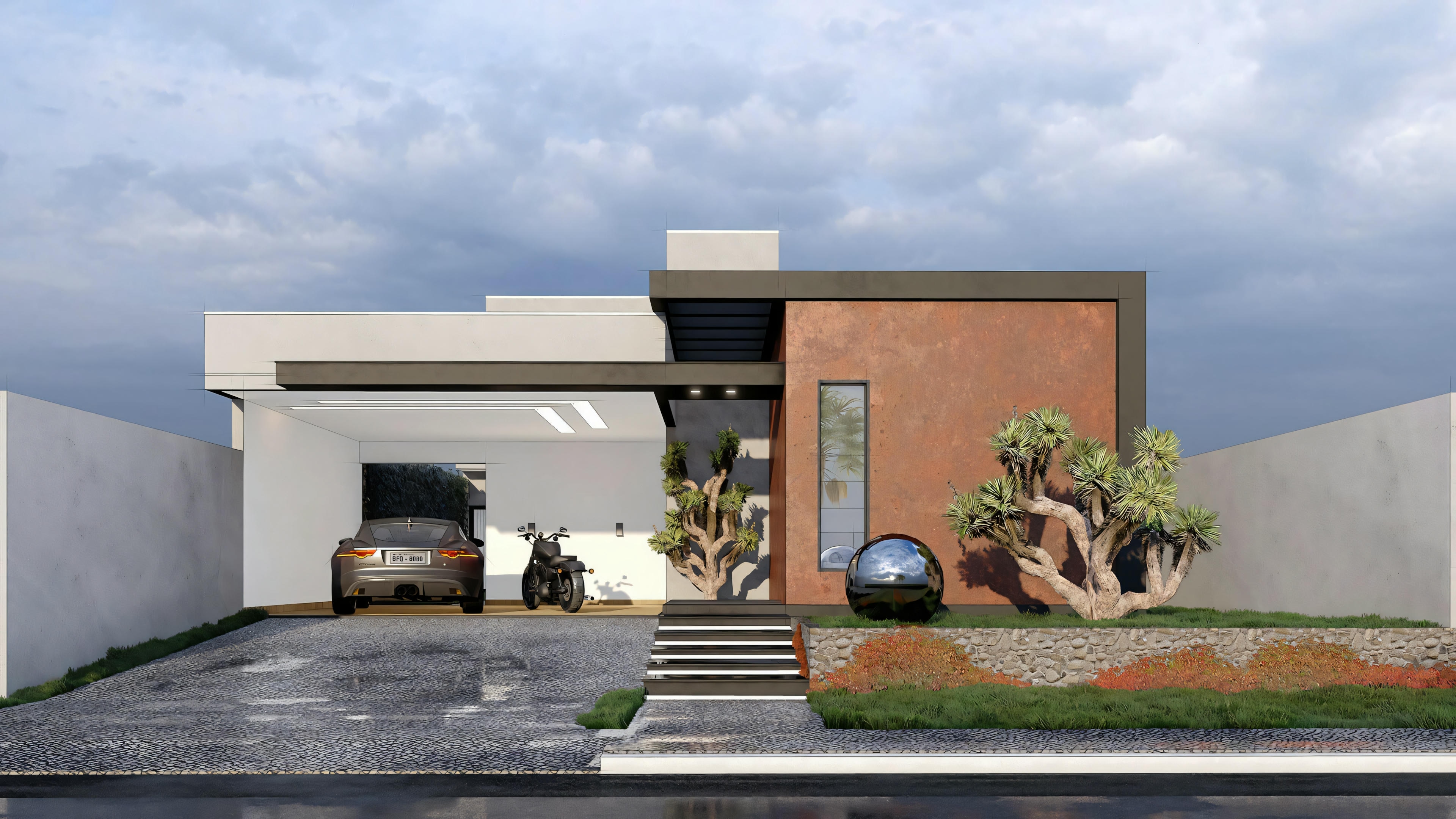 Una casa con techo plano, grandes ventanas, una pared de ladrillos y paisajismo con pequeños arbustos y un árbol.