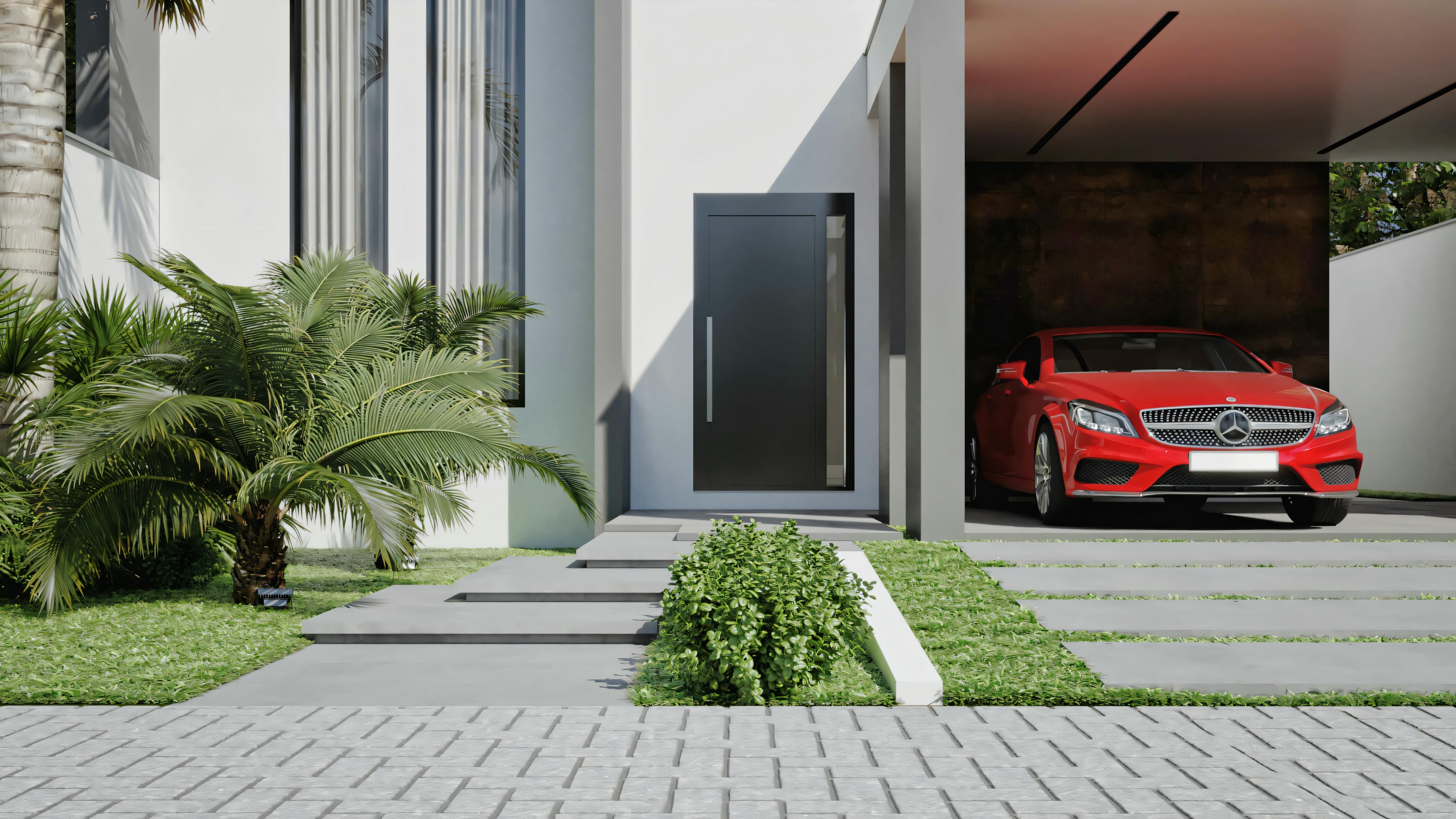 Exterior view of a modern house with entrance and red car parked at the entrance.