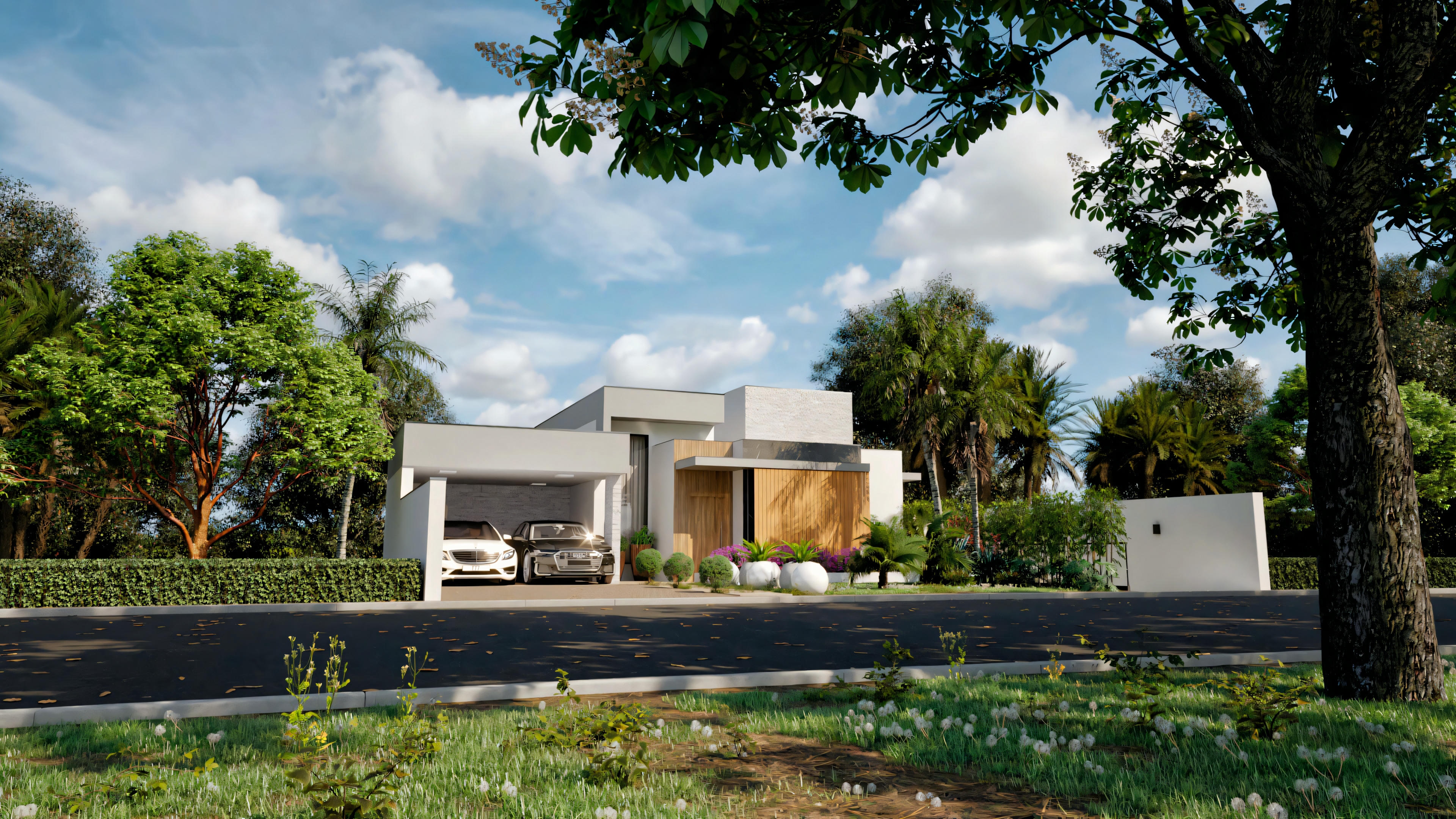Casa em um amplo terreno com árvores e áreas gramadas.