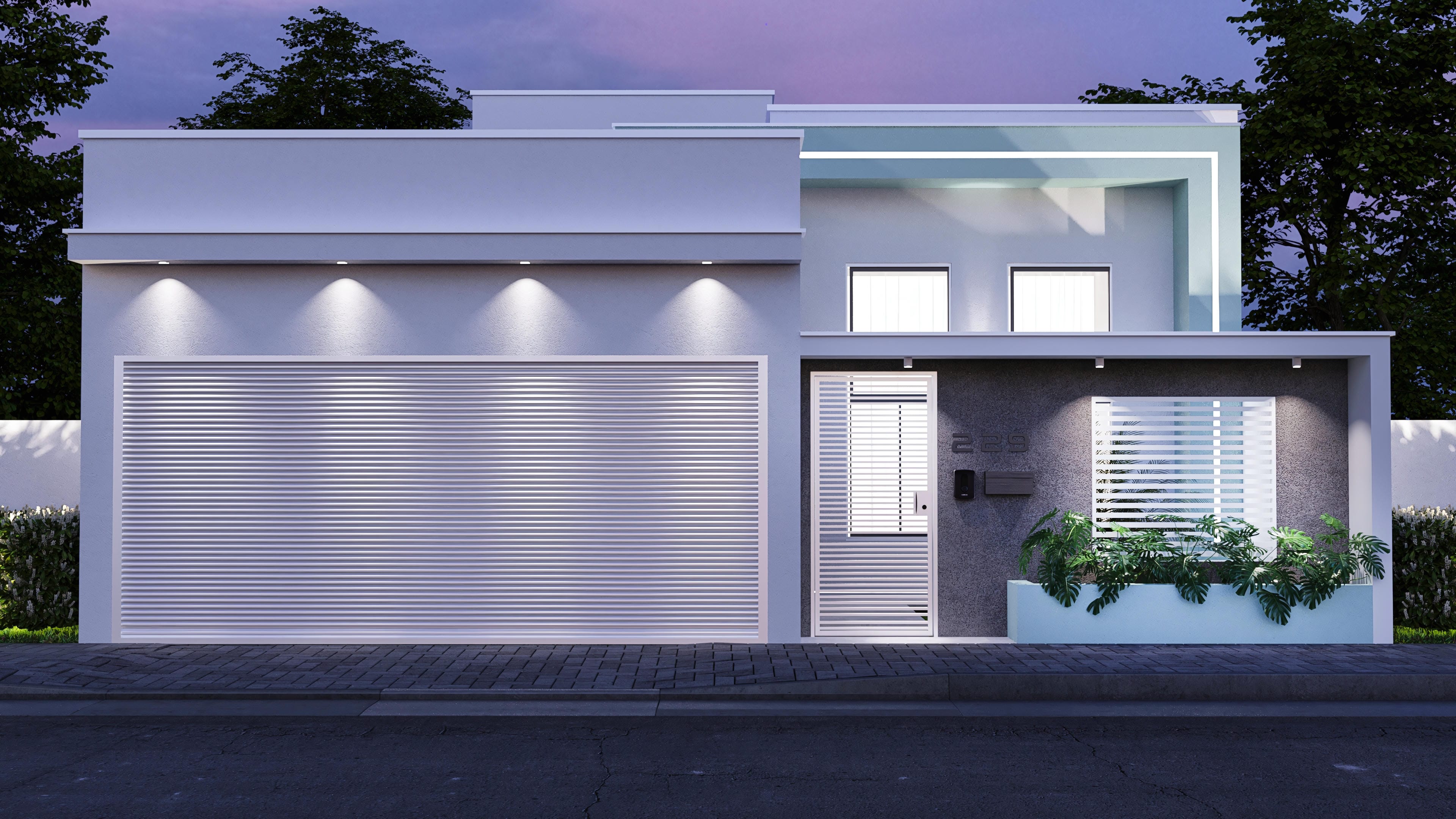 Modern facade of a single-story house on a 10x25 lot, with a gate, windows, and stone texture details.