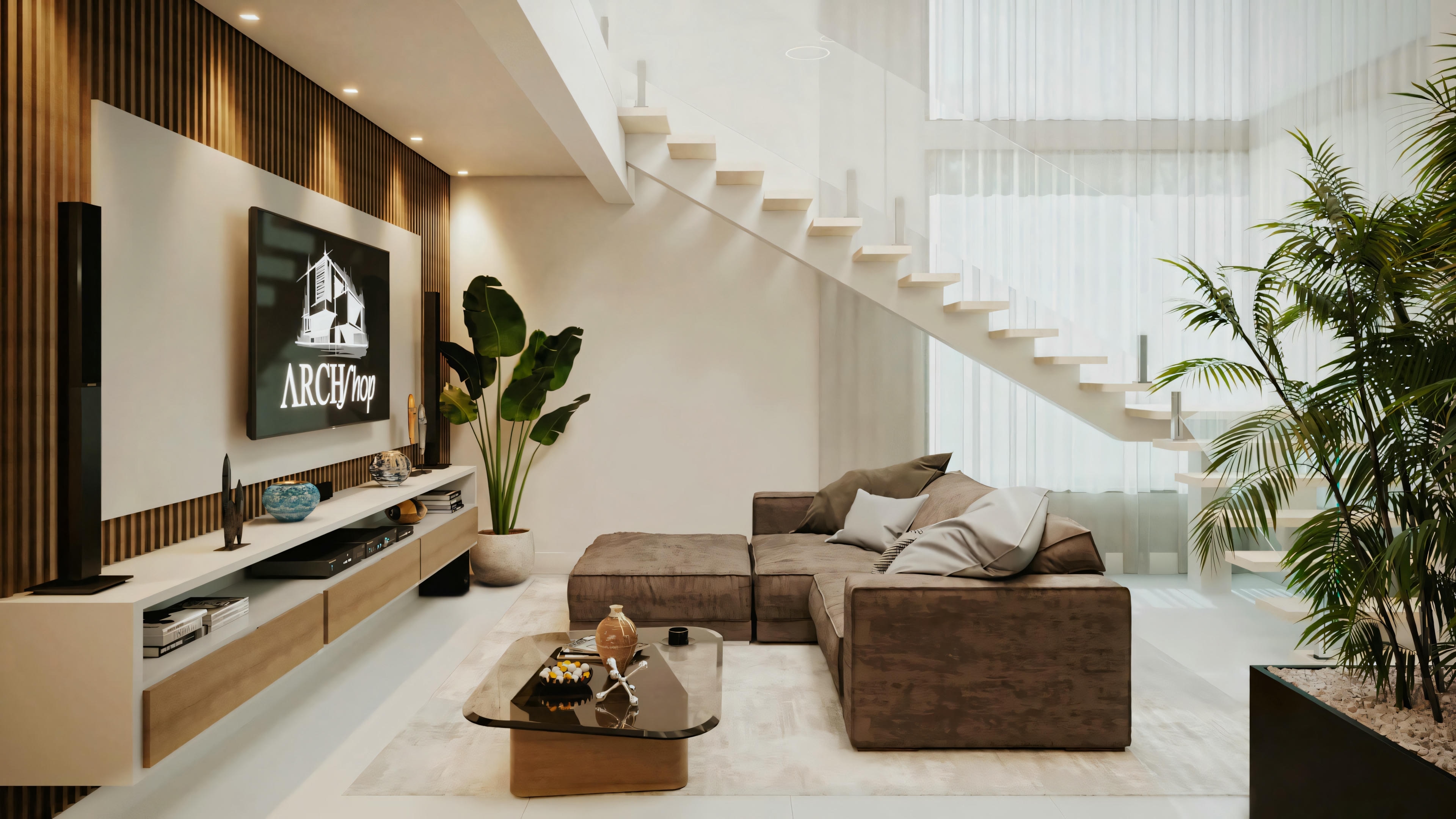 A modern living room with a gray sofa, armchairs, center table, and a staircase with wooden steps and glass railing.