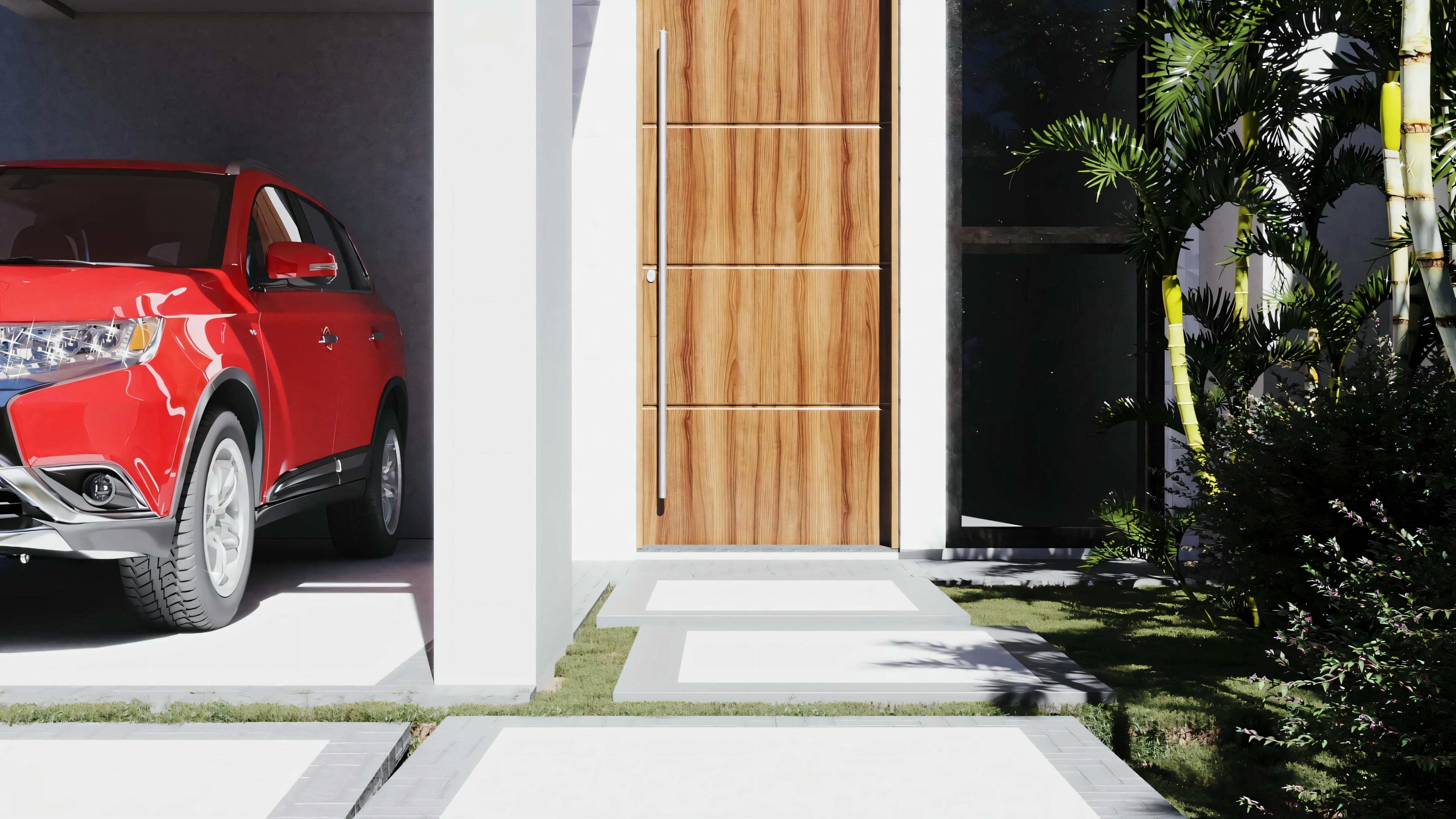 A red car parked in a modern house driveway with green foliage around.