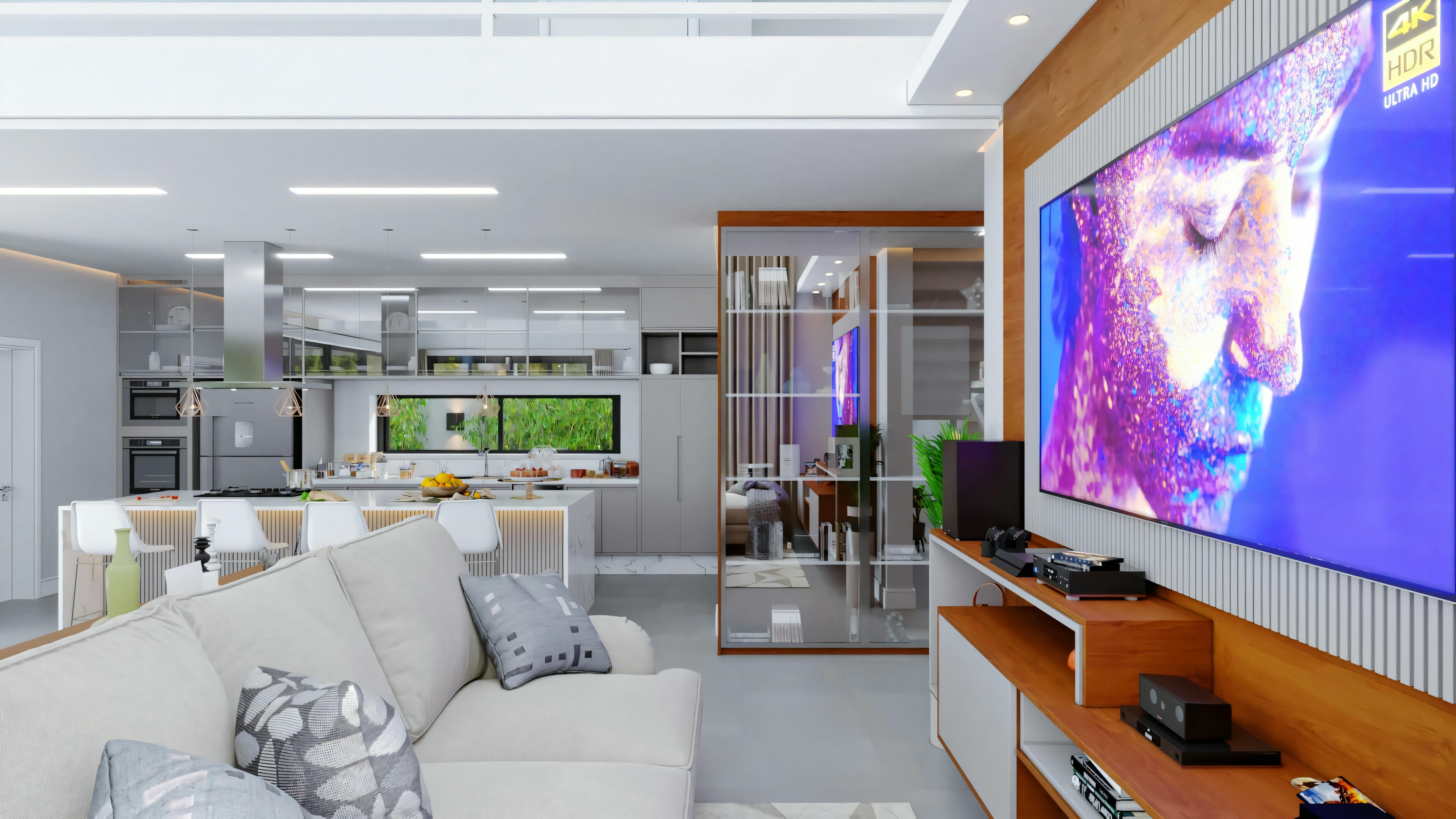 Sala de estar espaçosa com móveis contemporâneos e uma grande TV de tela plana.