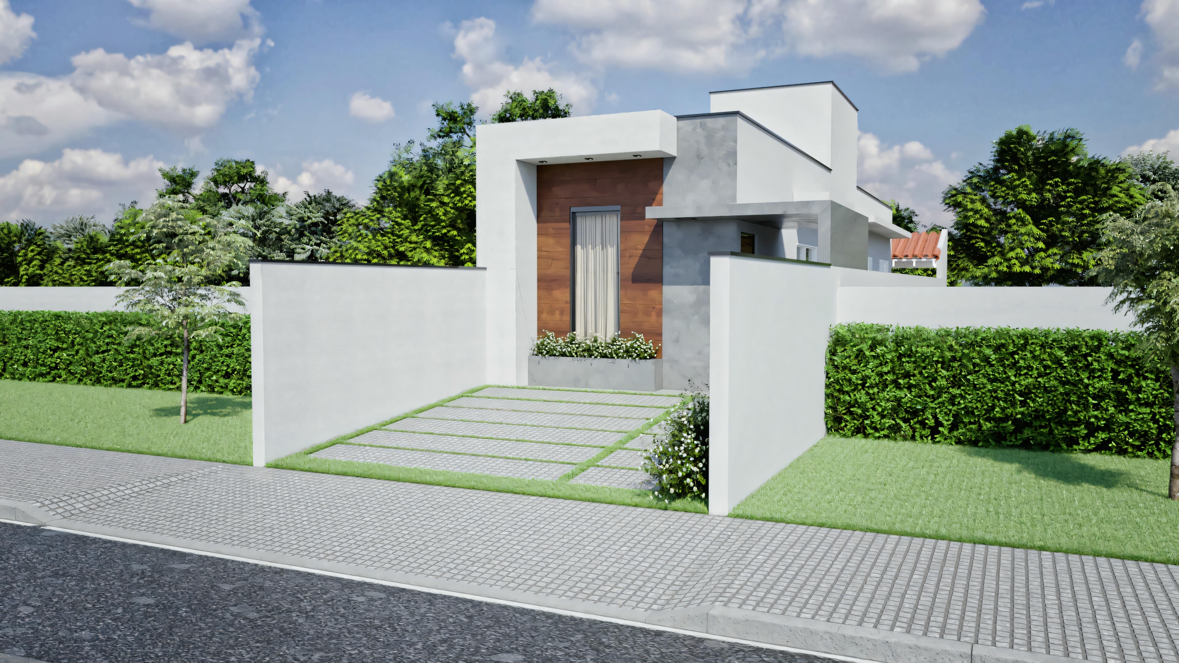 The same modern house during the day, providing a clear view of the design, materials, and surrounding environment.