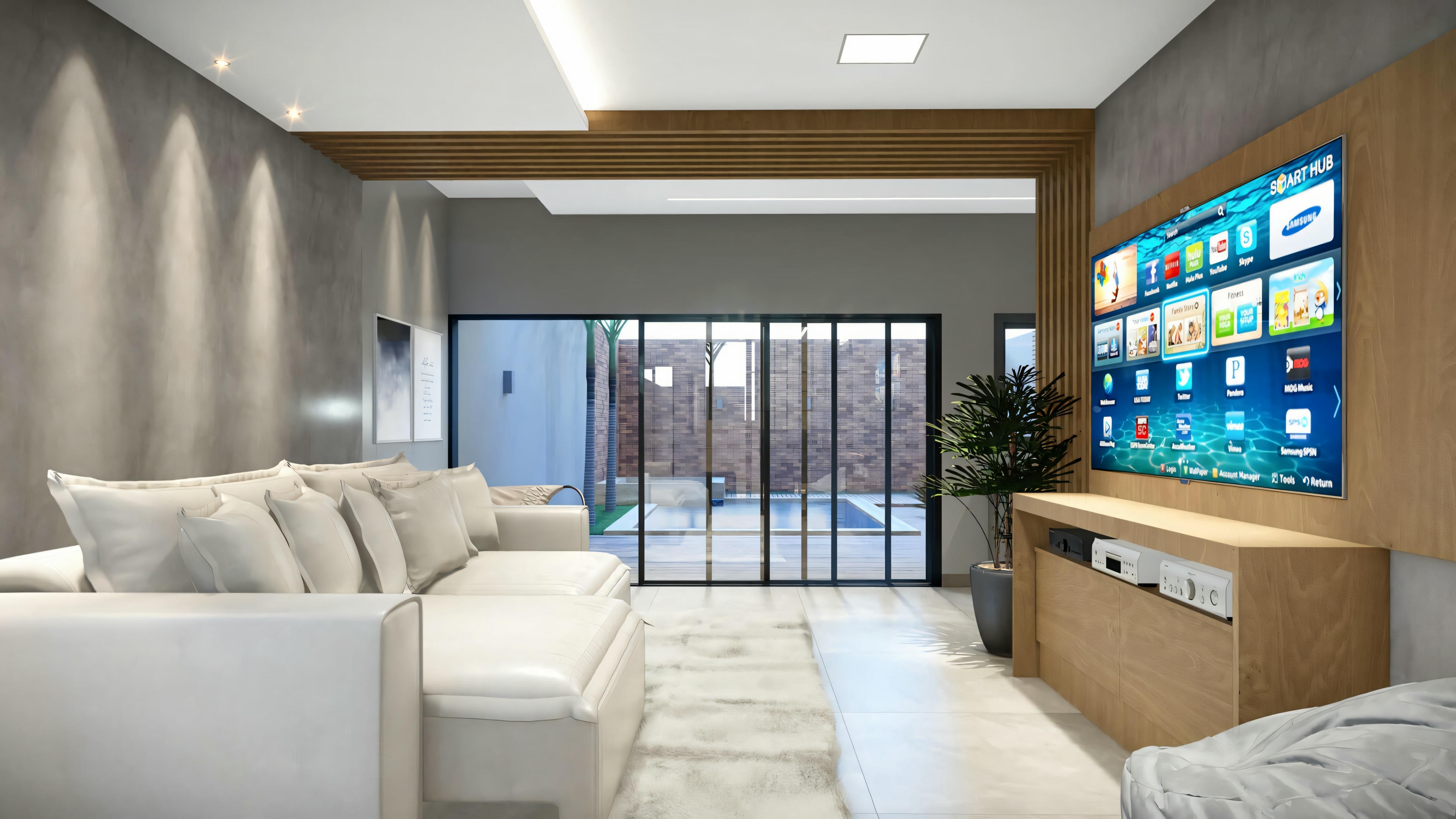 Modern living room with large sectional sofa, coffee table, and entertainment unit with multiple screens.