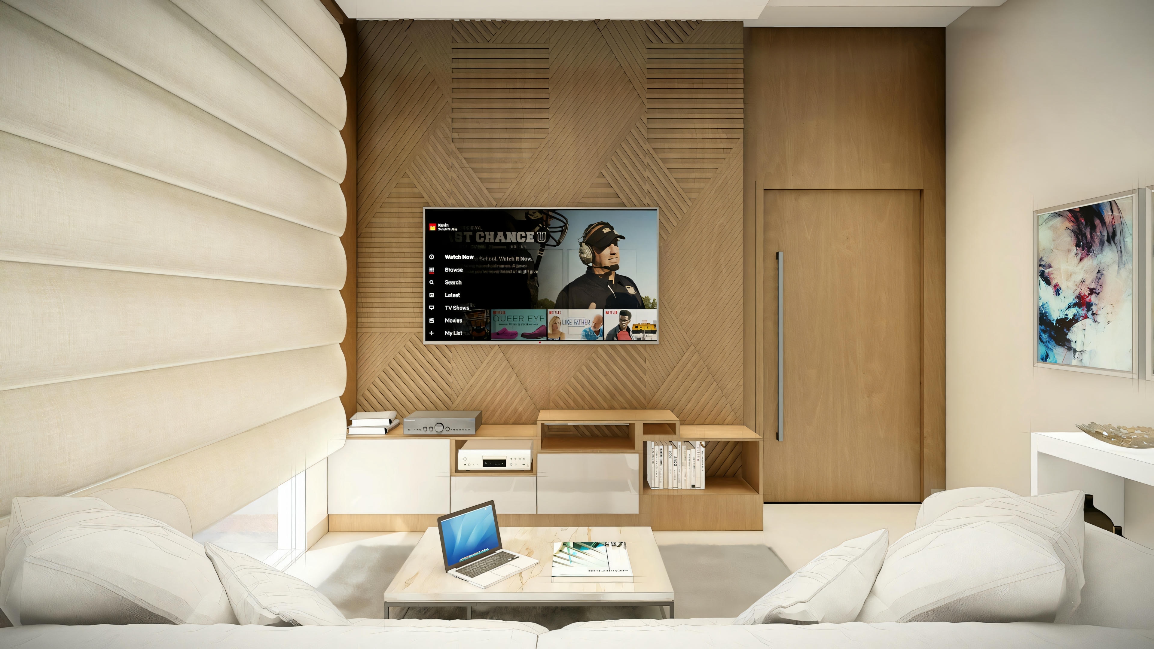 Cozy living room with large sofa, wall-mounted television, and wood paneling.