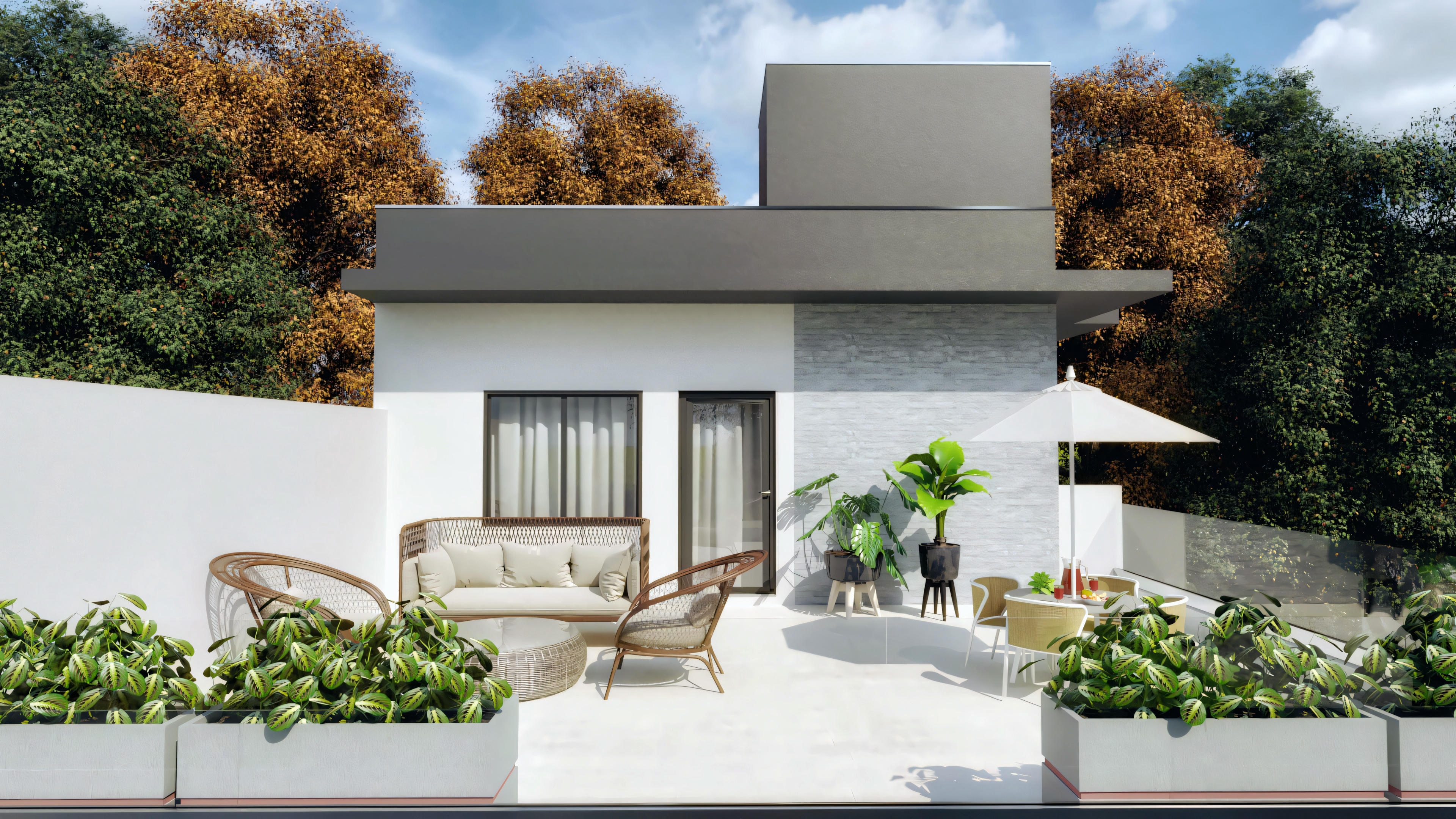 Modern house with a patio area, outdoor furniture, and landscaping.