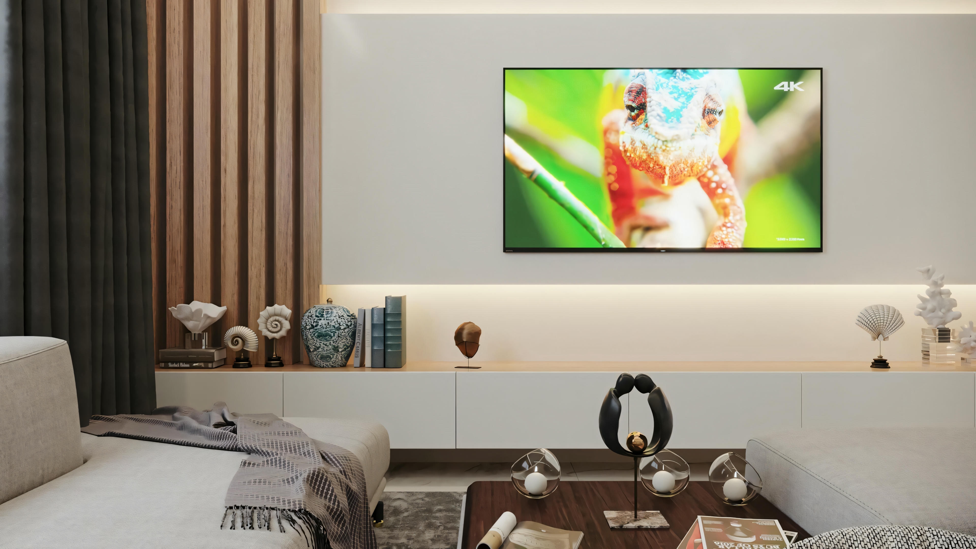 A modern living room with a blue and white color scheme, sofas, coffee table, and recessed ceiling lighting.