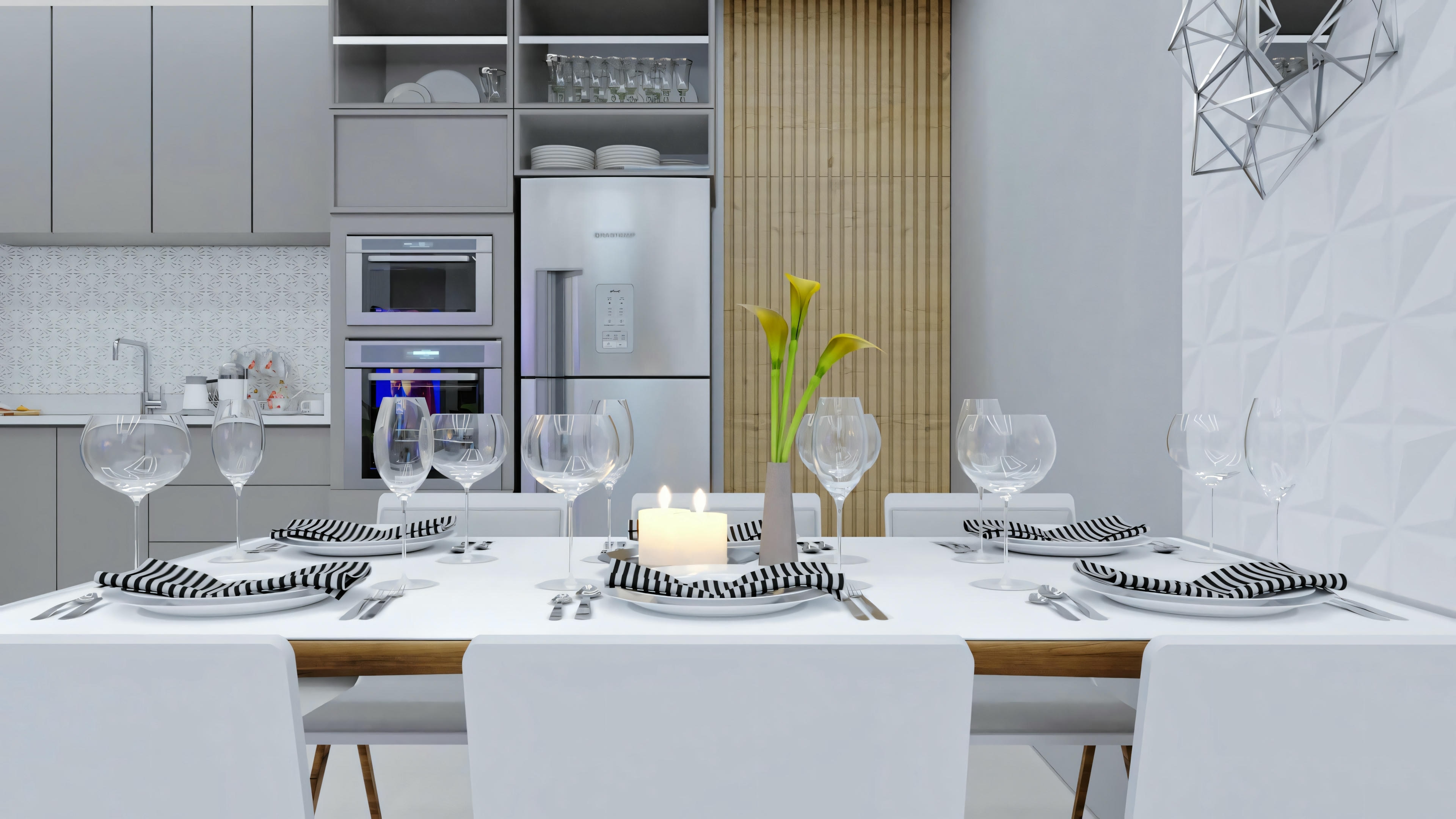 Uma área de jantar com mesa posta para uma refeição, incluindo pratos, copos e talheres, com uma cozinha ao fundo.