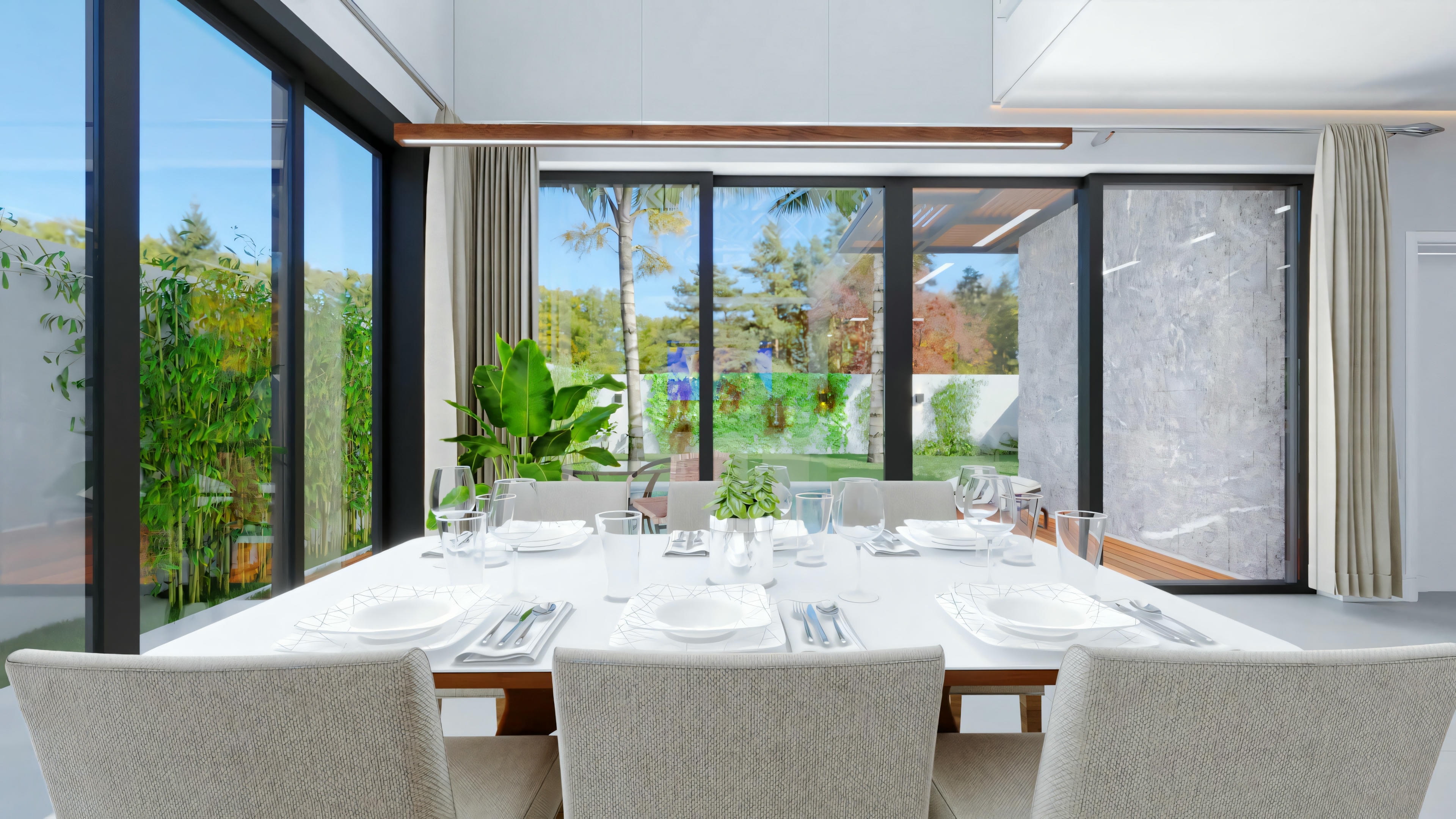 A dining area with a table set for a meal, surrounded by large windows offering an exterior view.