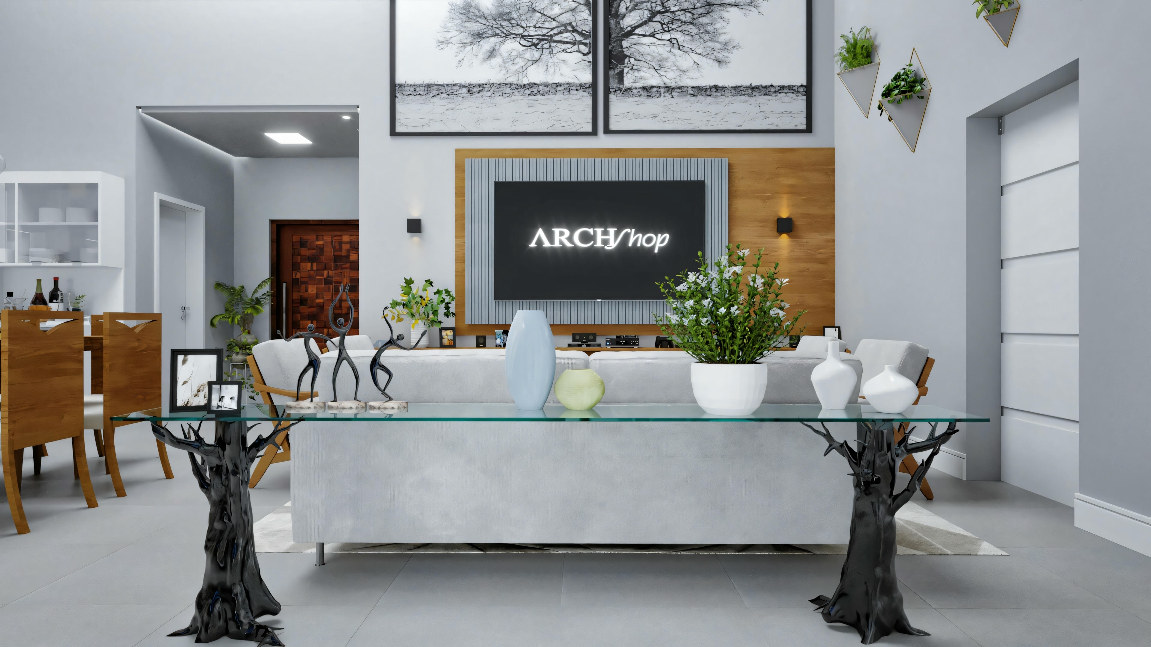 View of a modern living room with contemporary furniture, neutral color palette, plants, and artwork.