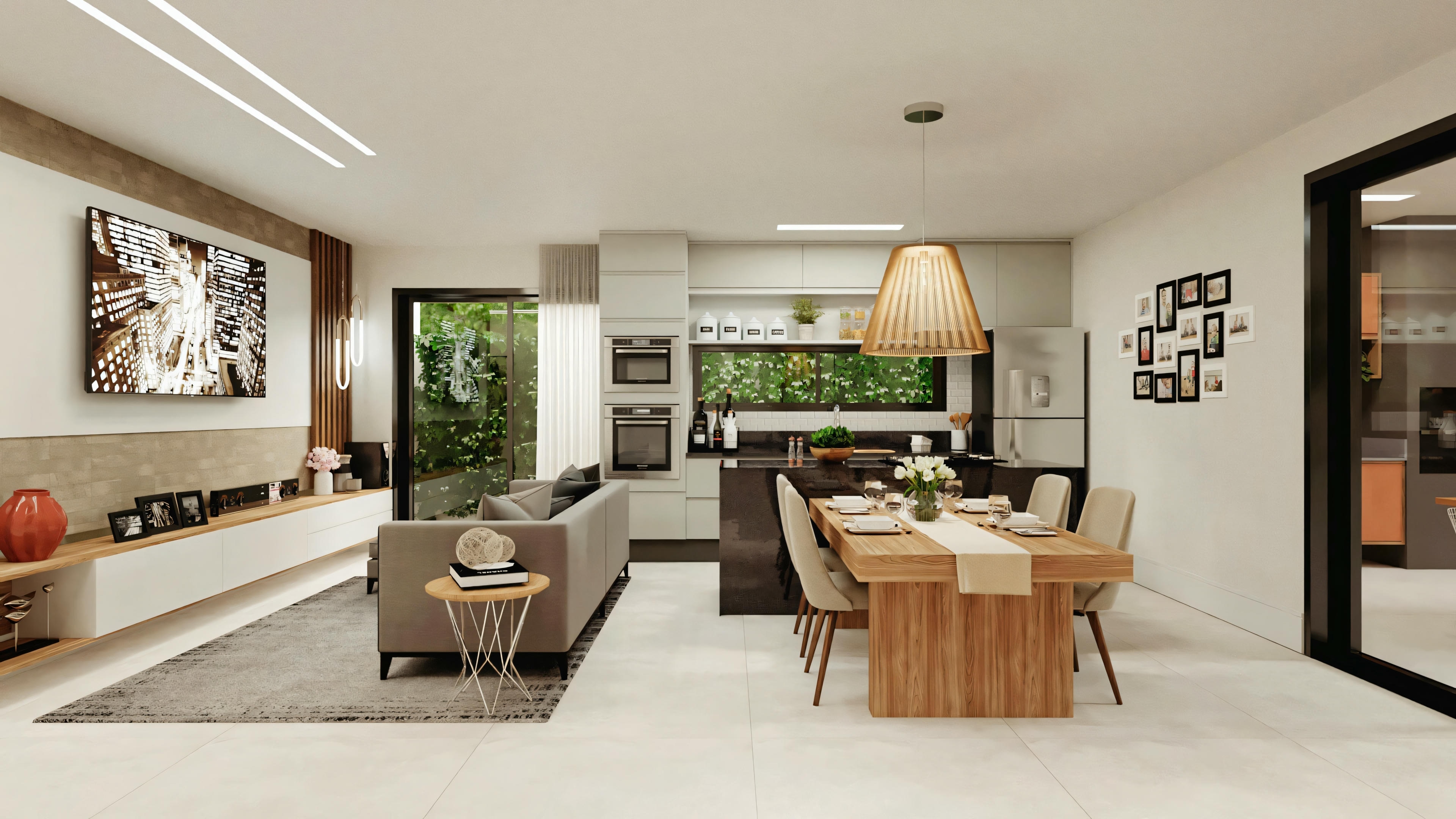 Open plan area with dining set adjacent to a kitchen with stools at the counter.
