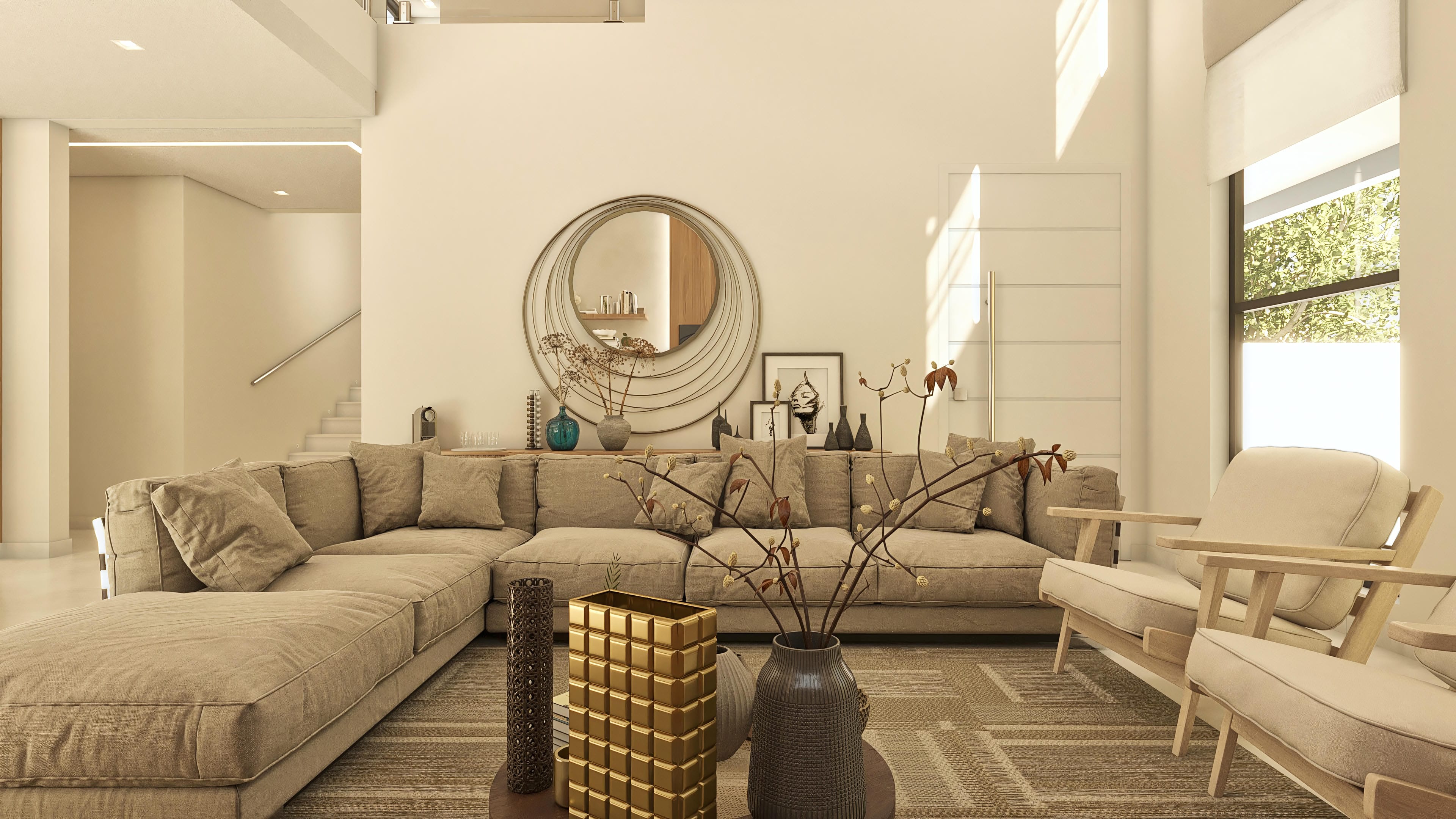 Vista interior de sala de estar con sofá modular beige, sillones de madera clara, espejo redondo decorativo e iluminación indirecta, en una casa de dos plantas con 4 suites.