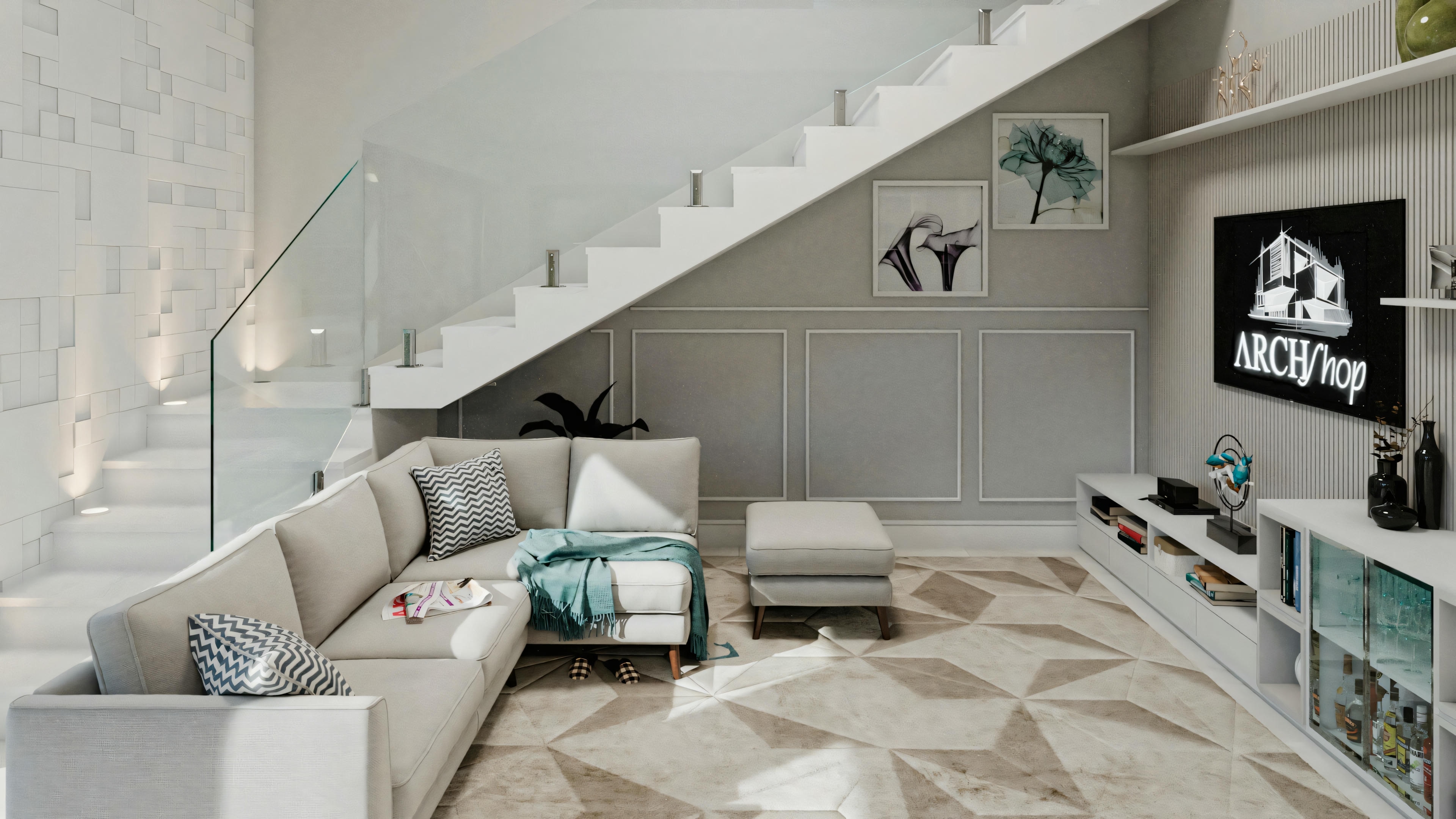 Sala de estar con sofá, mesa de centro y decoraciones en la pared.