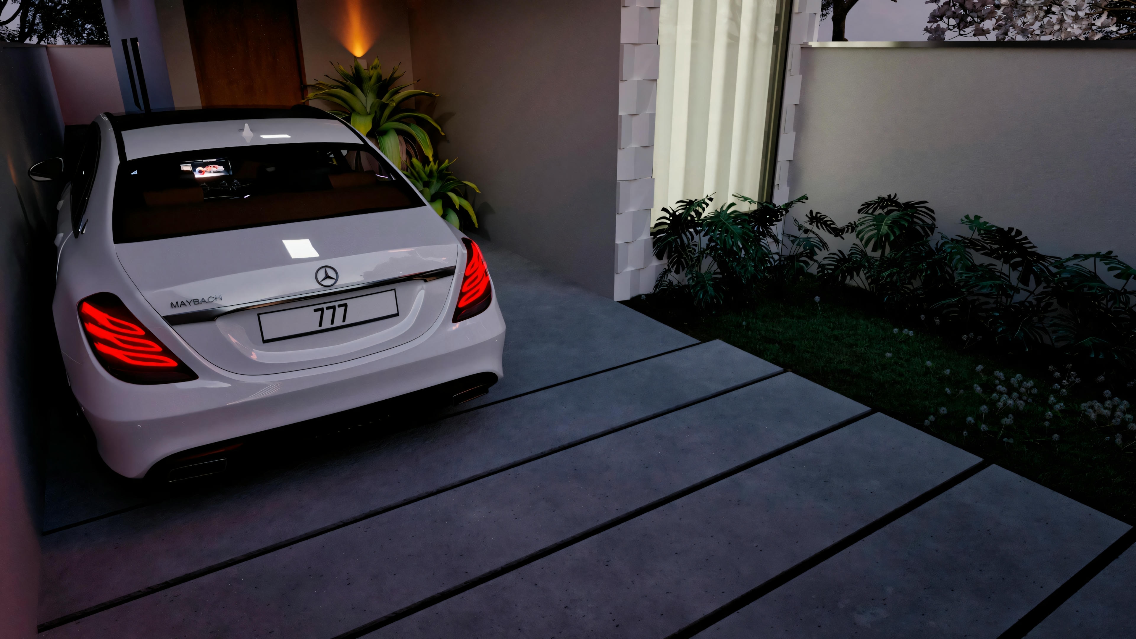 A white car parked on a dark tiled driveway next to greenery, under the cover of a modern house at dusk.