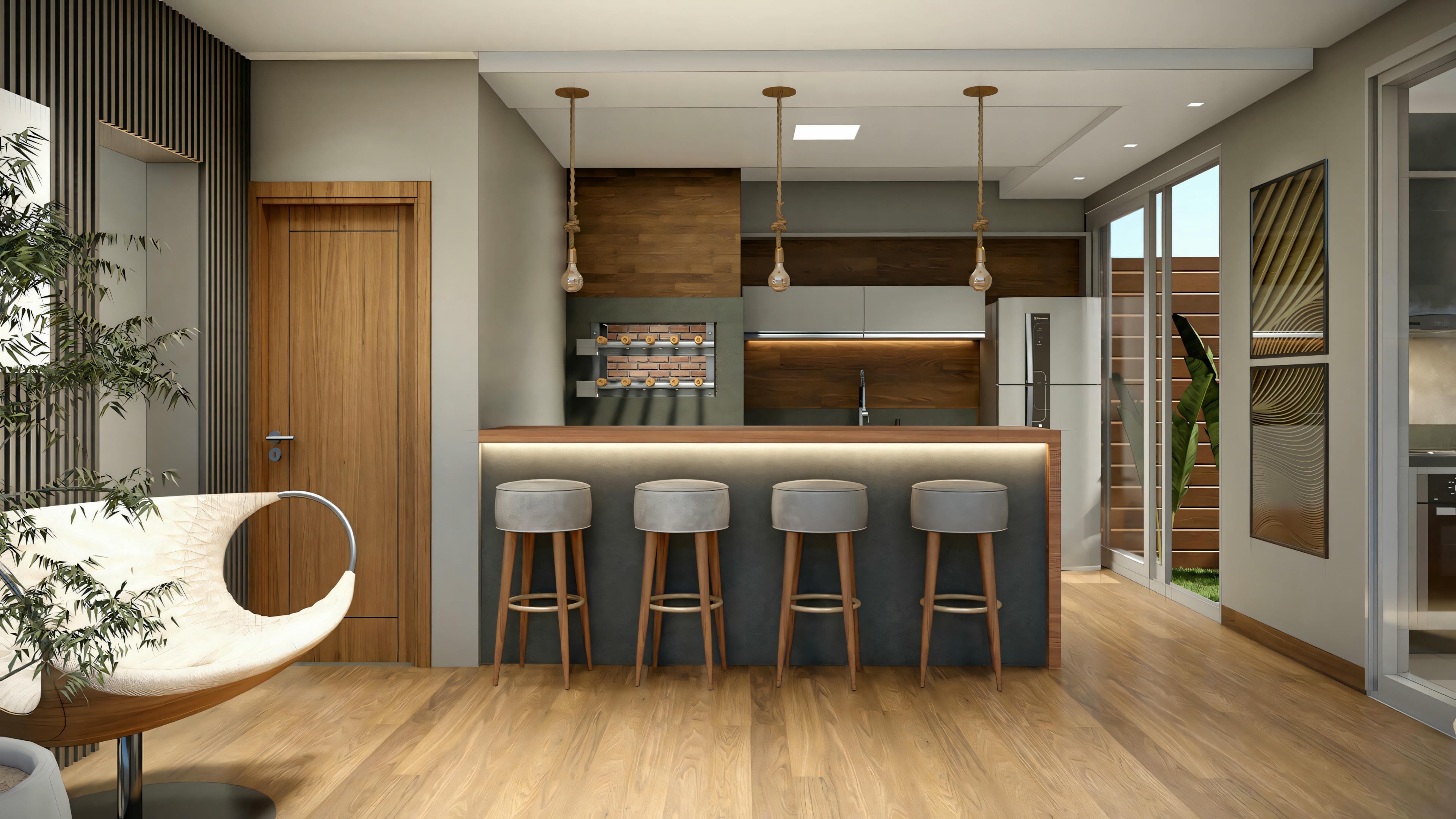 Cocina moderna con electrodomésticos y una barra de desayuno.