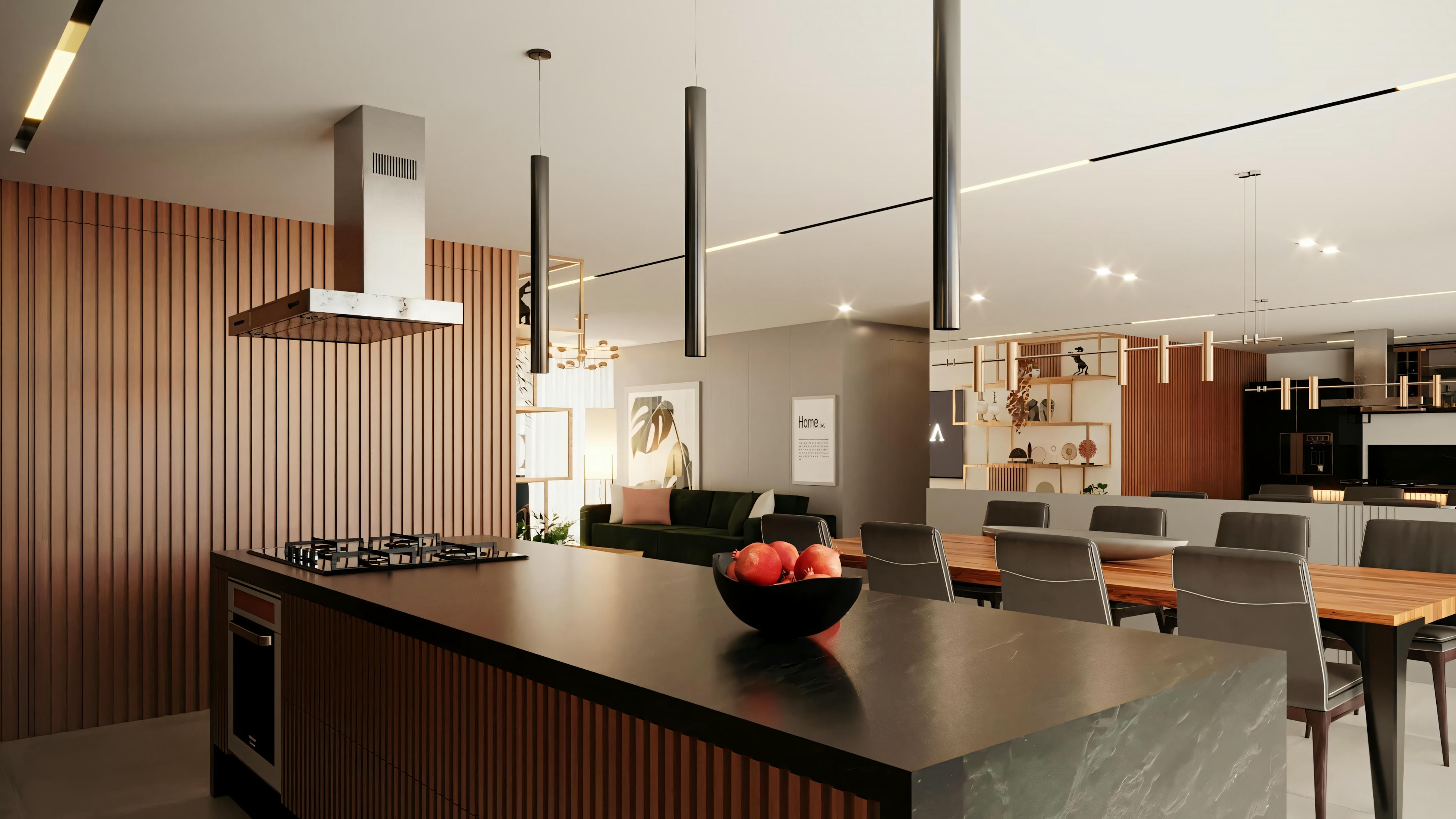 Uma cozinha moderna com eletrodomésticos contemporâneos e iluminação pendente.