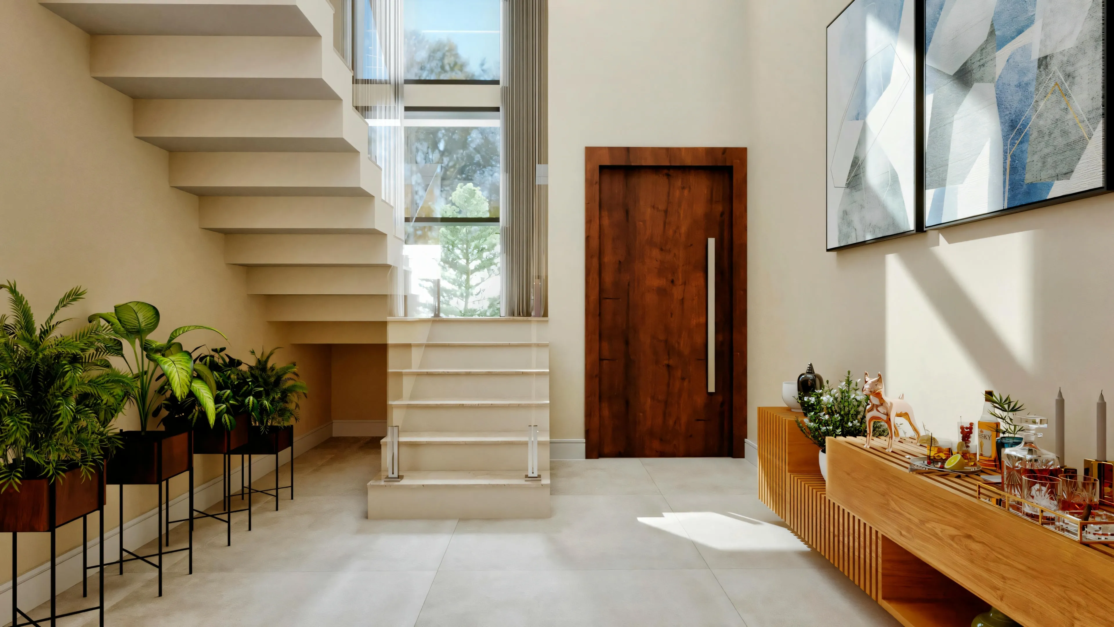 Um hall de entrada iluminado com uma escada, uma mesa de console de madeira e uma grande porta de entrada.