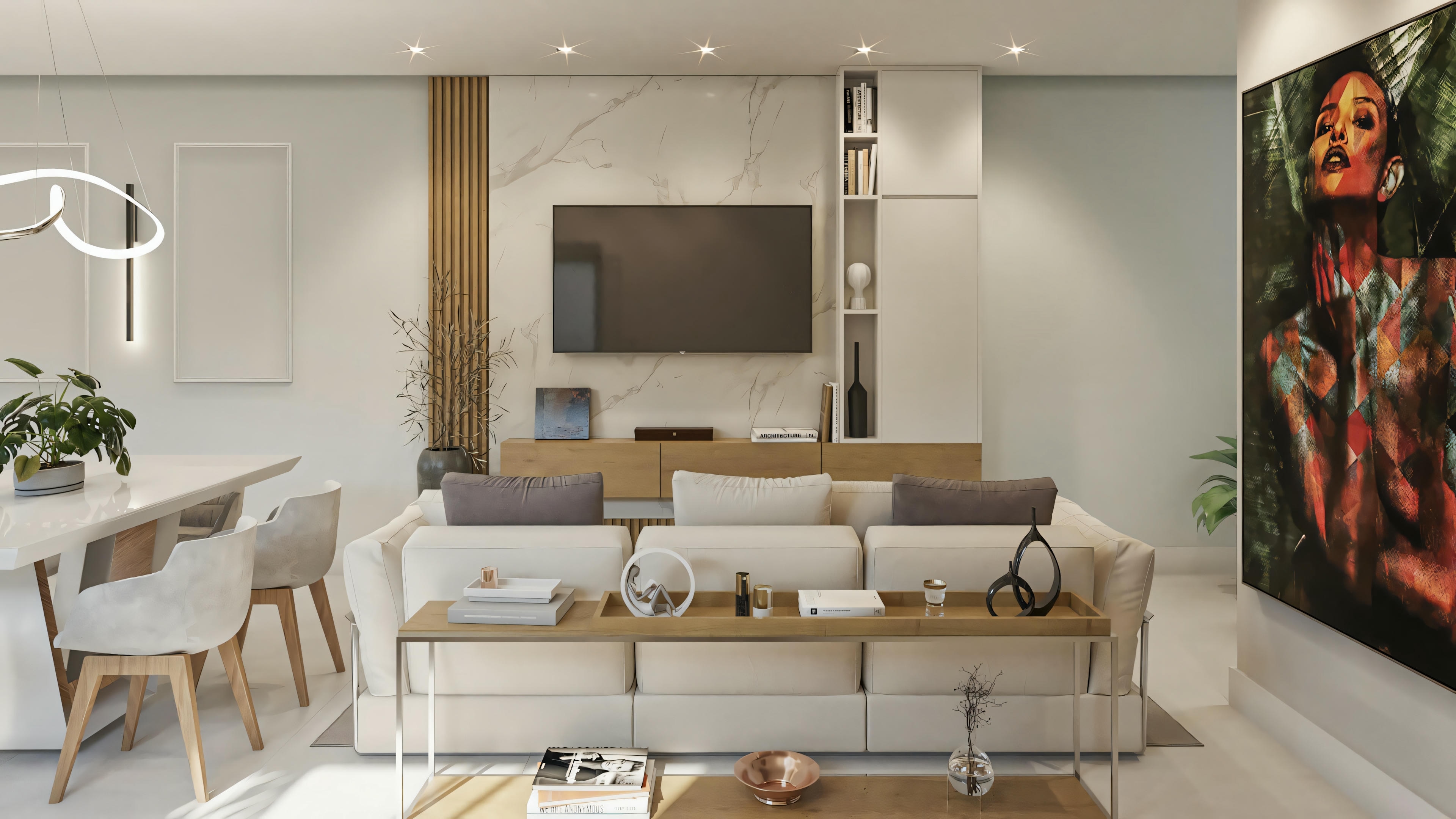 Living room with sofa, chairs, and television in a wall unit, with artwork on the wall and large windows letting in natural light.