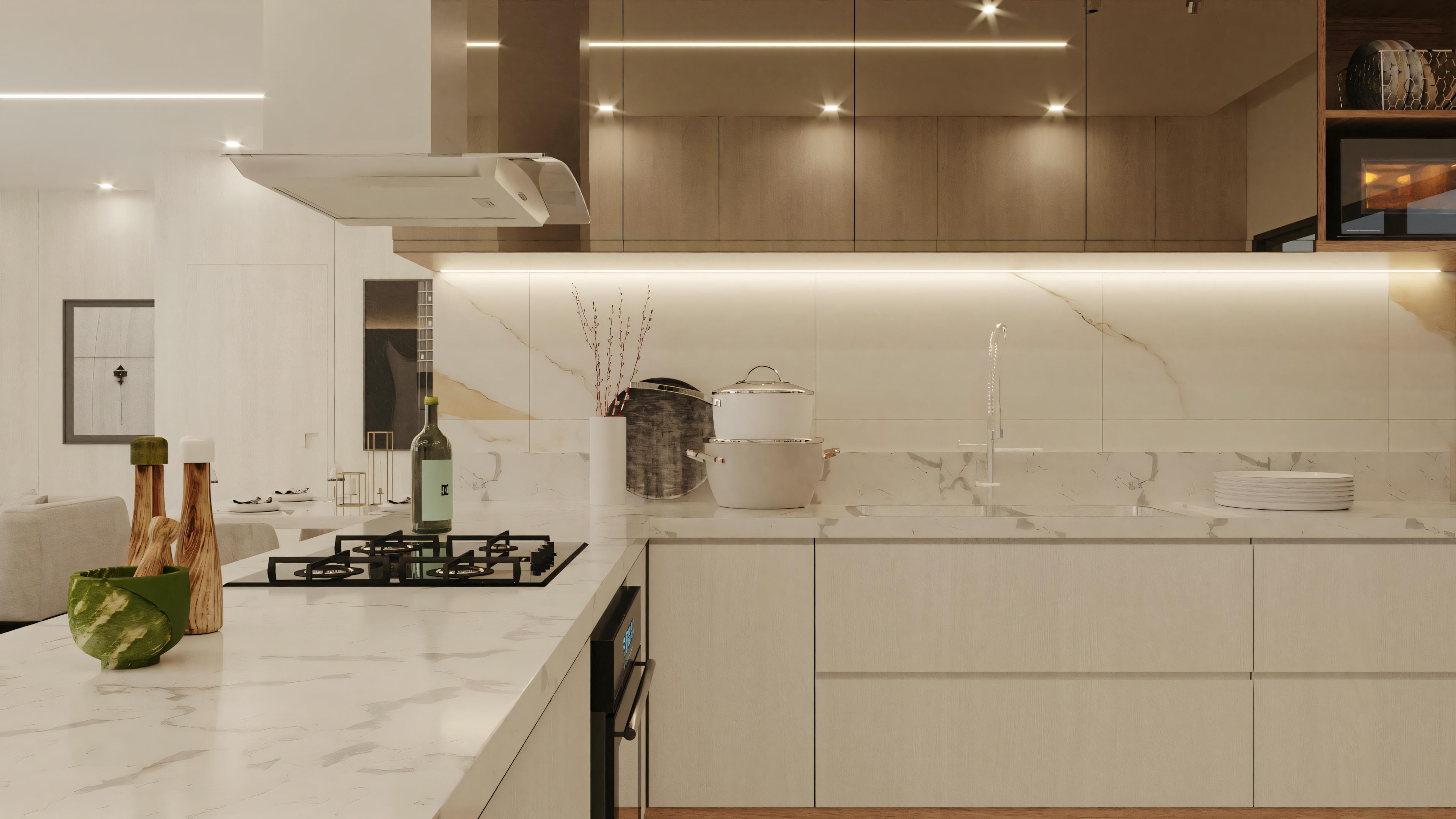 Una cocina moderna con armarios blancos, electrodomésticos de acero inoxidable e iluminación empotrada, vista desde un ángulo diferente.