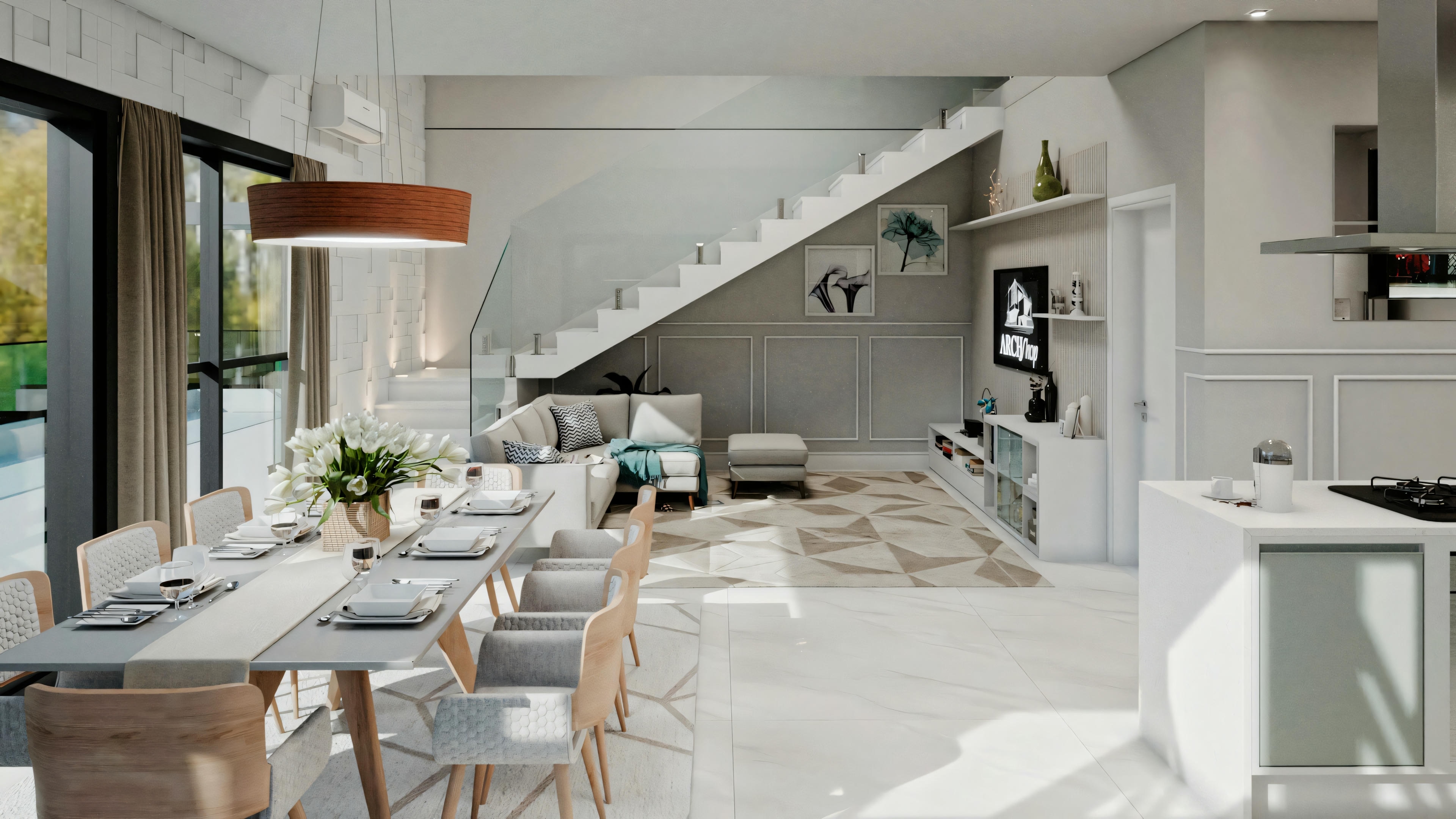 Kitchen with a dining table, cabinets in neutral tones, and stairs in the background leading to another level.