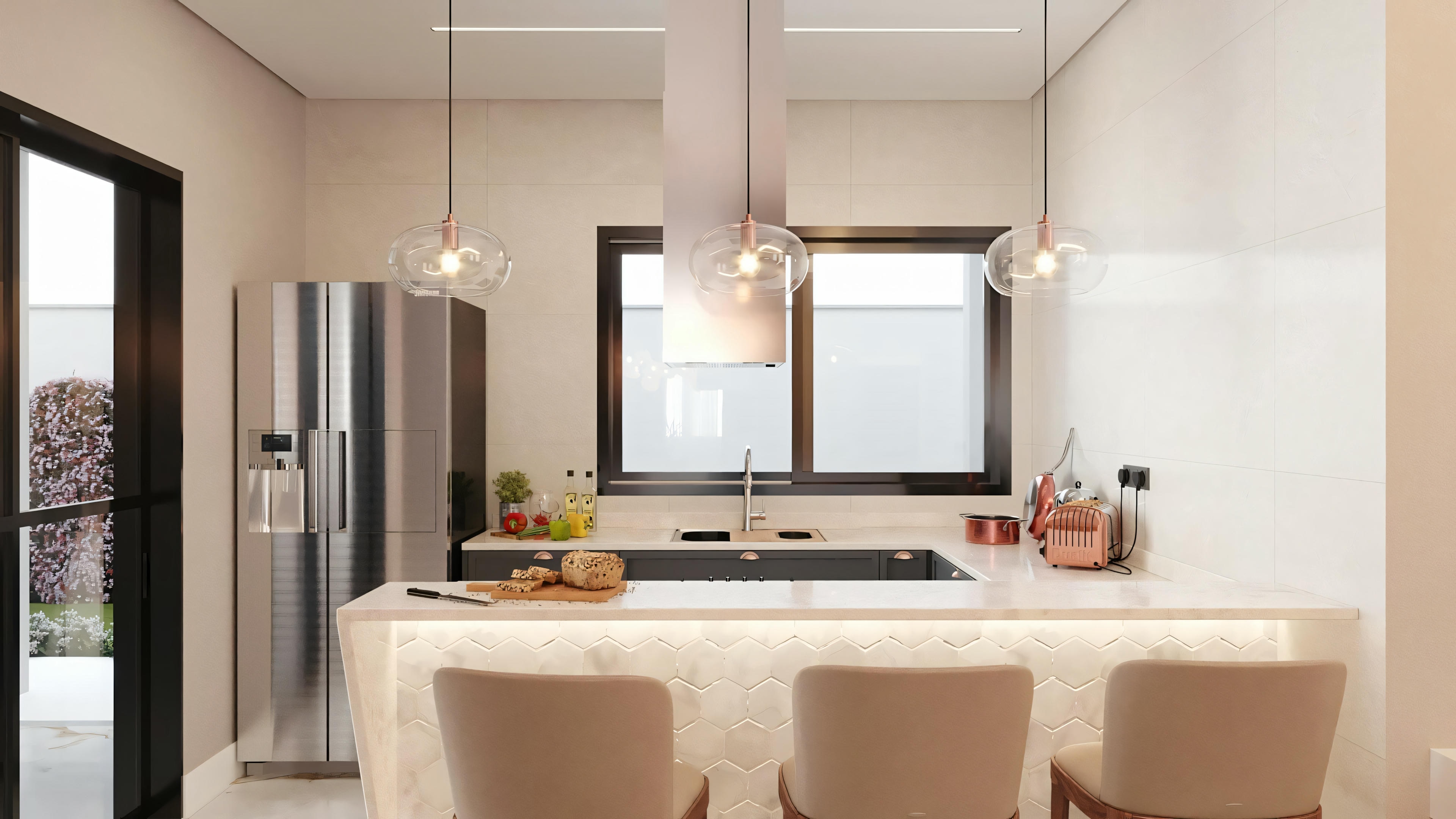 A kitchen with modern appliances, countertop, cabinets, and a mirror reflecting the kitchen interior.