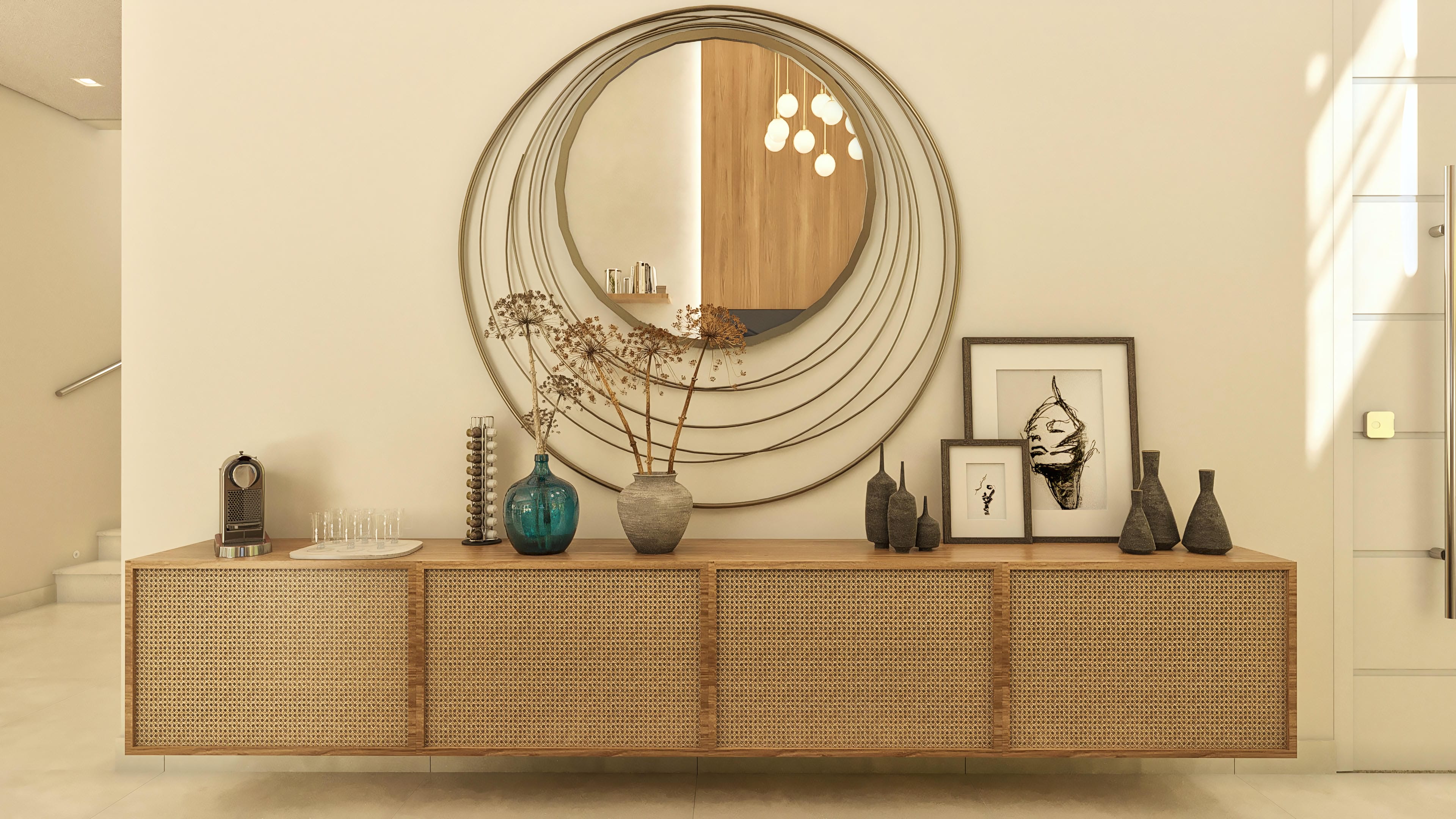 Wooden bookshelf with woven details, round mirror with organic frame, and decoration with artwork and vases.
