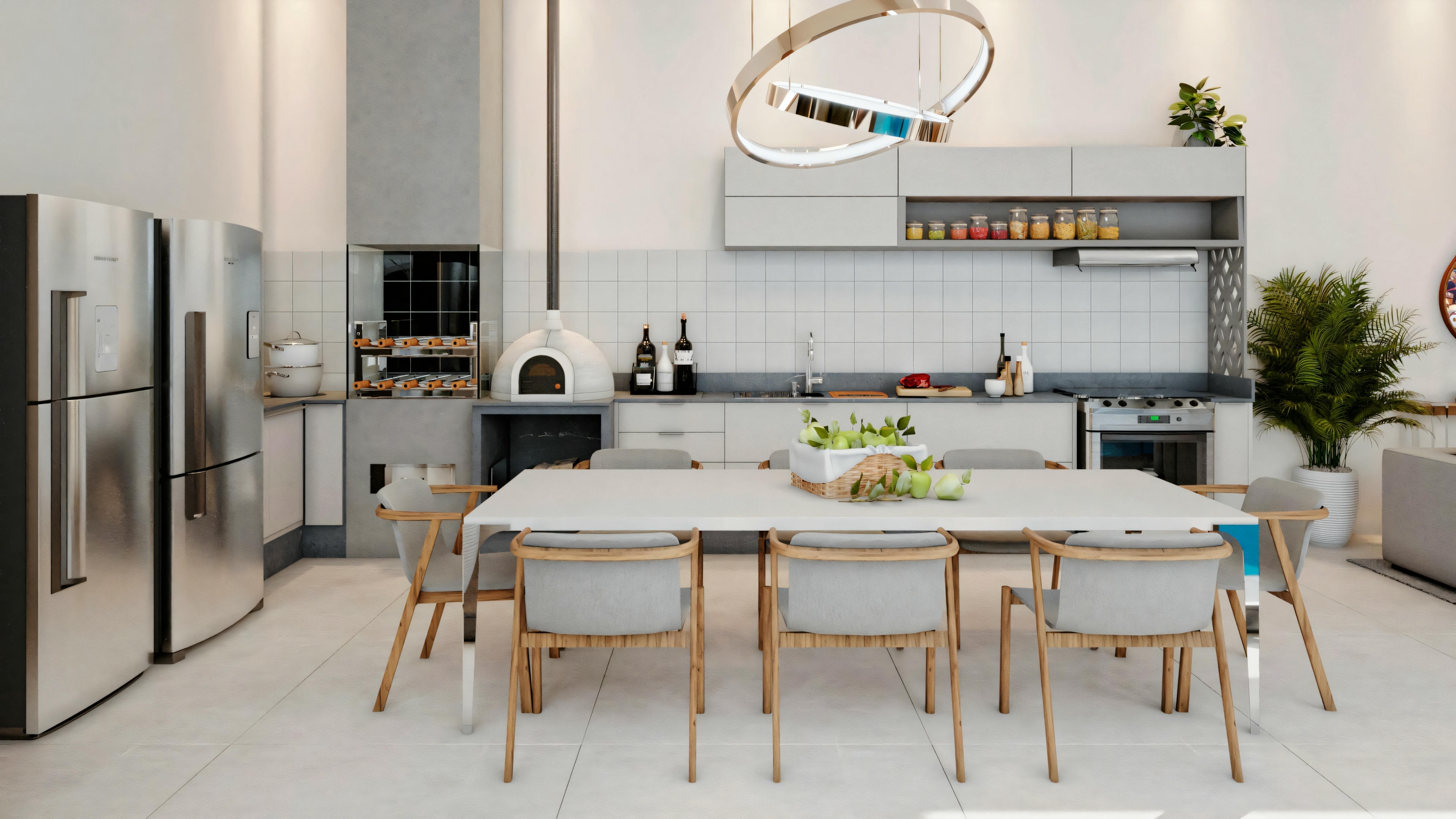 Una cocina moderna con armarios blancos, electrodomésticos de acero inoxidable, isla central con fregadero y banquetas, y área de comedor con mesa de madera y sillas.