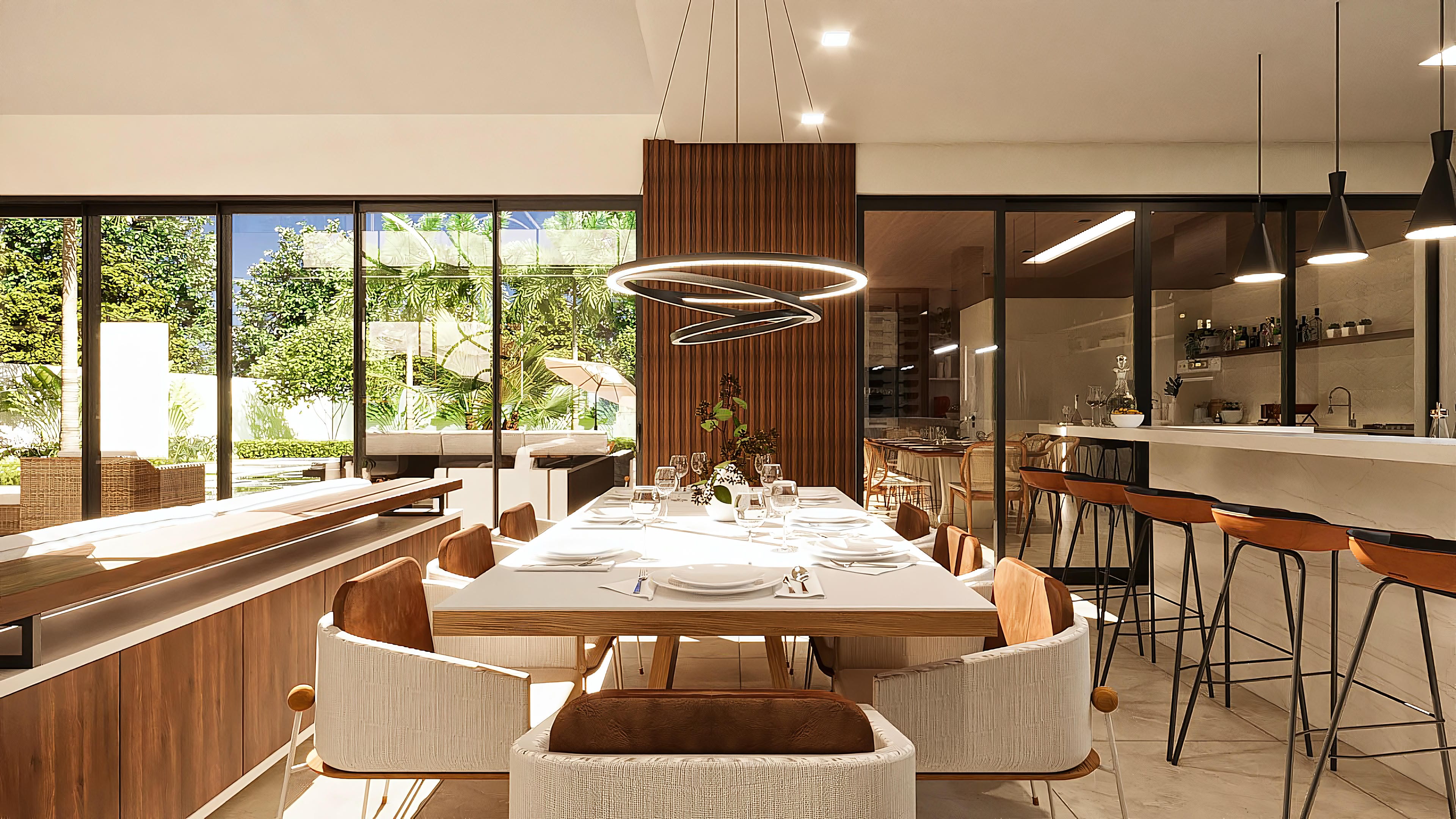 Espaço de jantar moderno e sofisticado com mesa posta, cadeiras estofadas, e um balcão de bar com banquetas, integrado à cozinha. Destaque para os materiais como madeira e mármore.