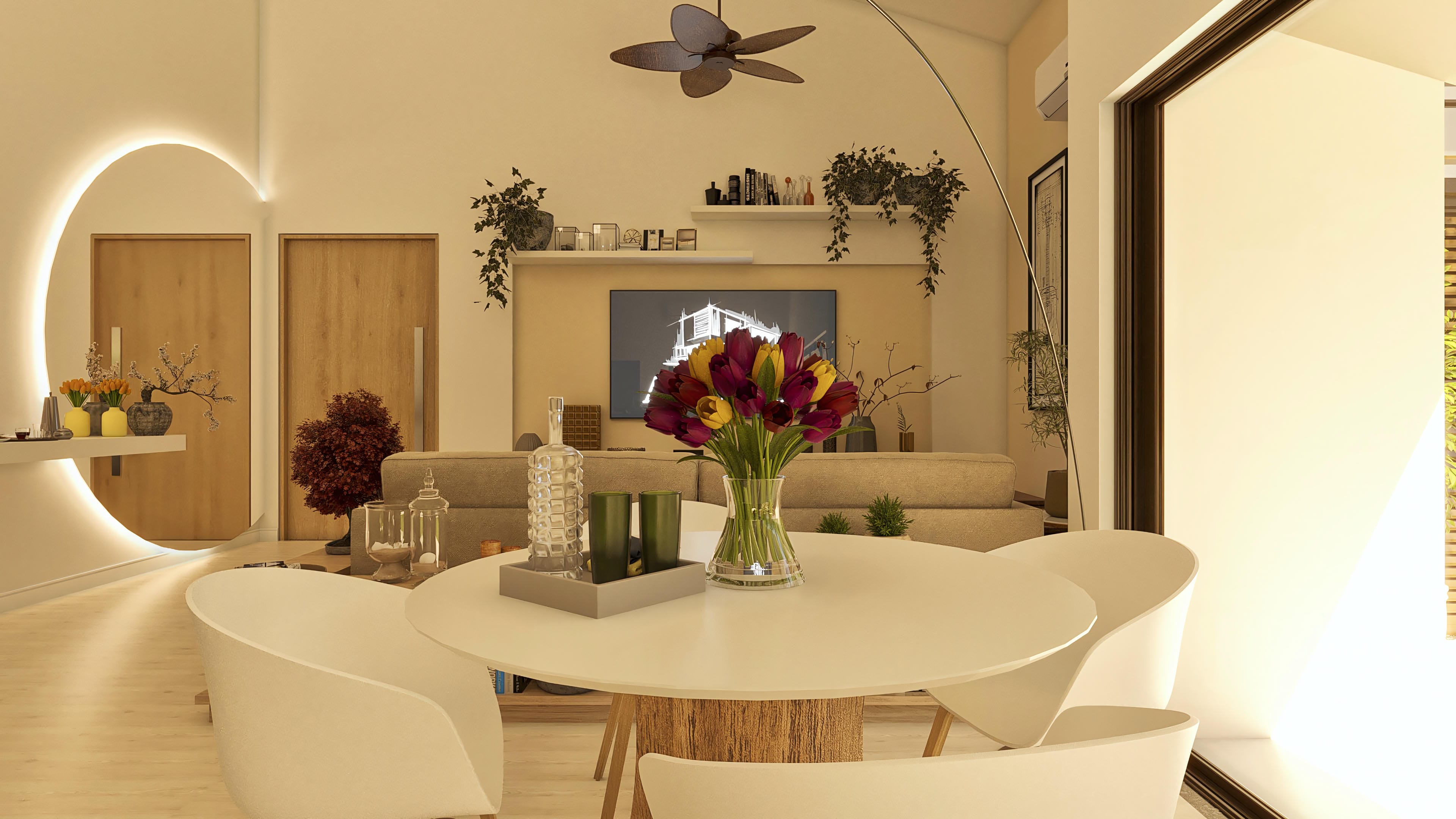 Vista interna de una casa de una planta moderna con sala de estar y comedor integradas, presentando mesa redonda con sillas blancas, sofá beige, ventilador de techo e iluminación empotrada.
