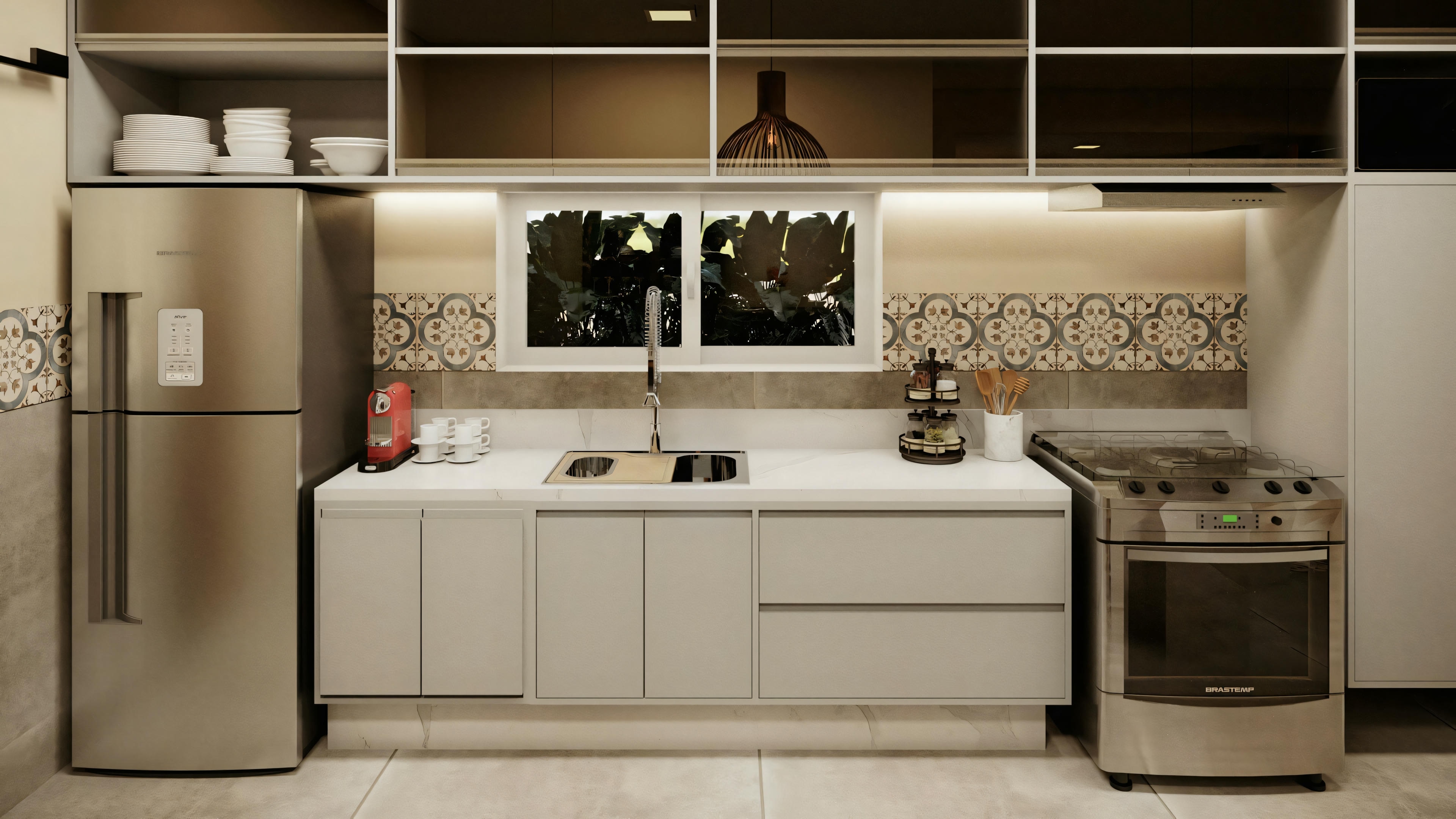 Cocina con encimeras, armarios, fregadero, horno y azulejos decorativos en la pared.