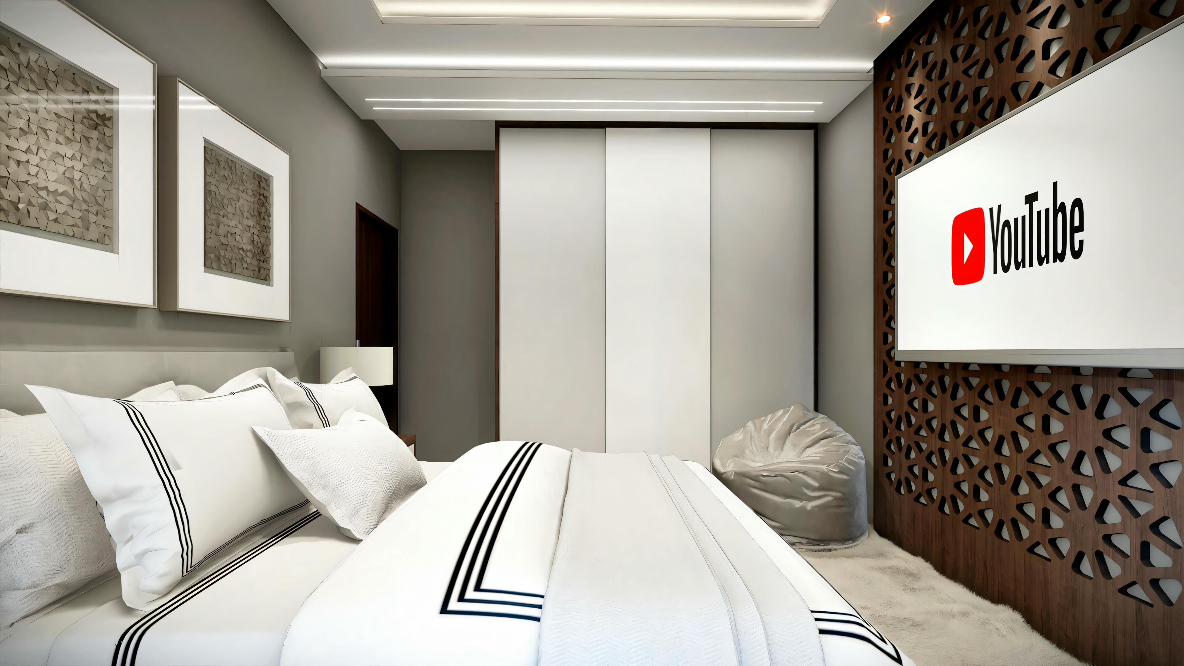 Un dormitorio con una cama grande, ropa de cama blanca y una pared destacada roja con el logotipo de YouTube.