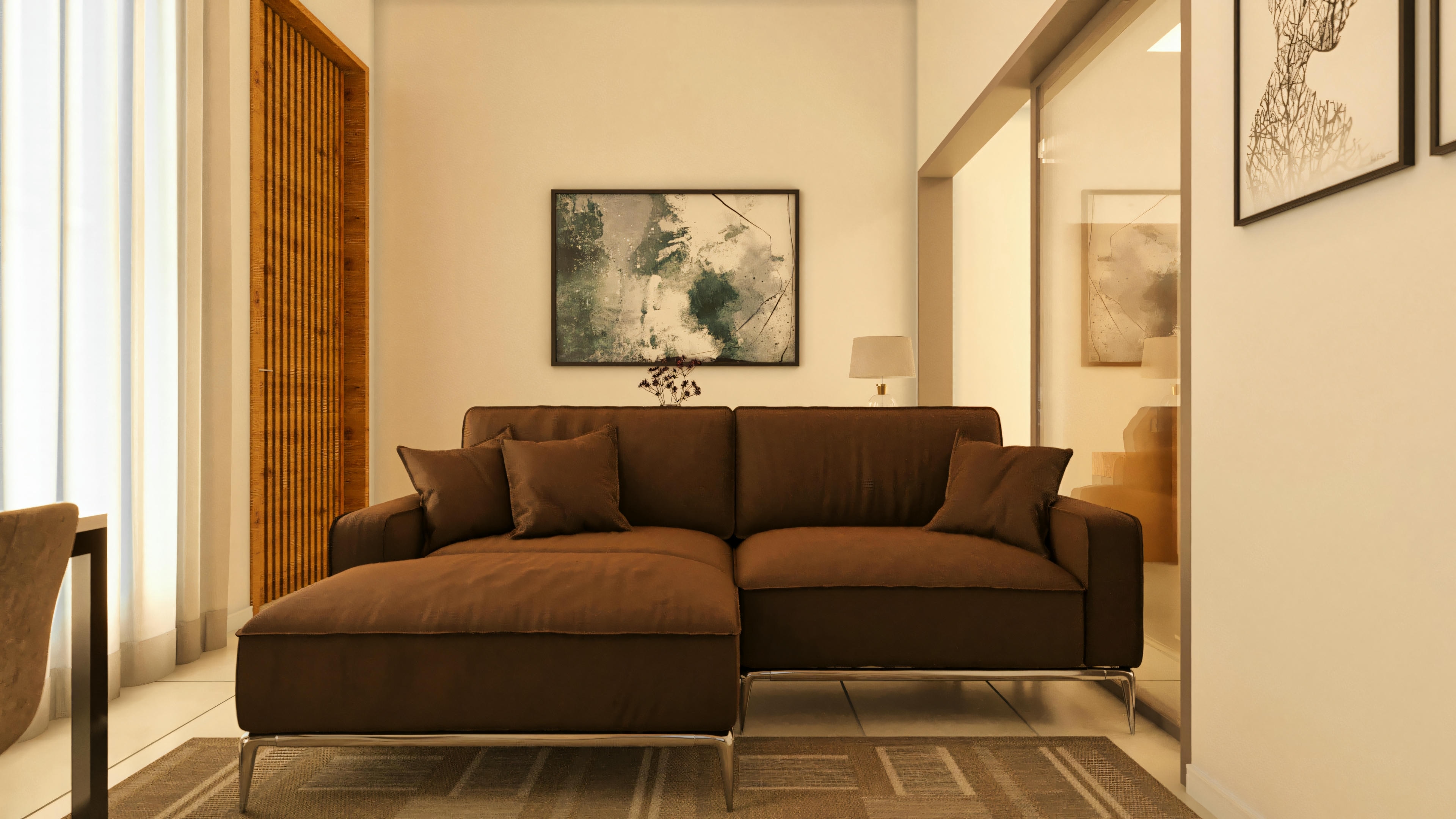 Sala de estar moderna con sofá grande y decoración minimalista.