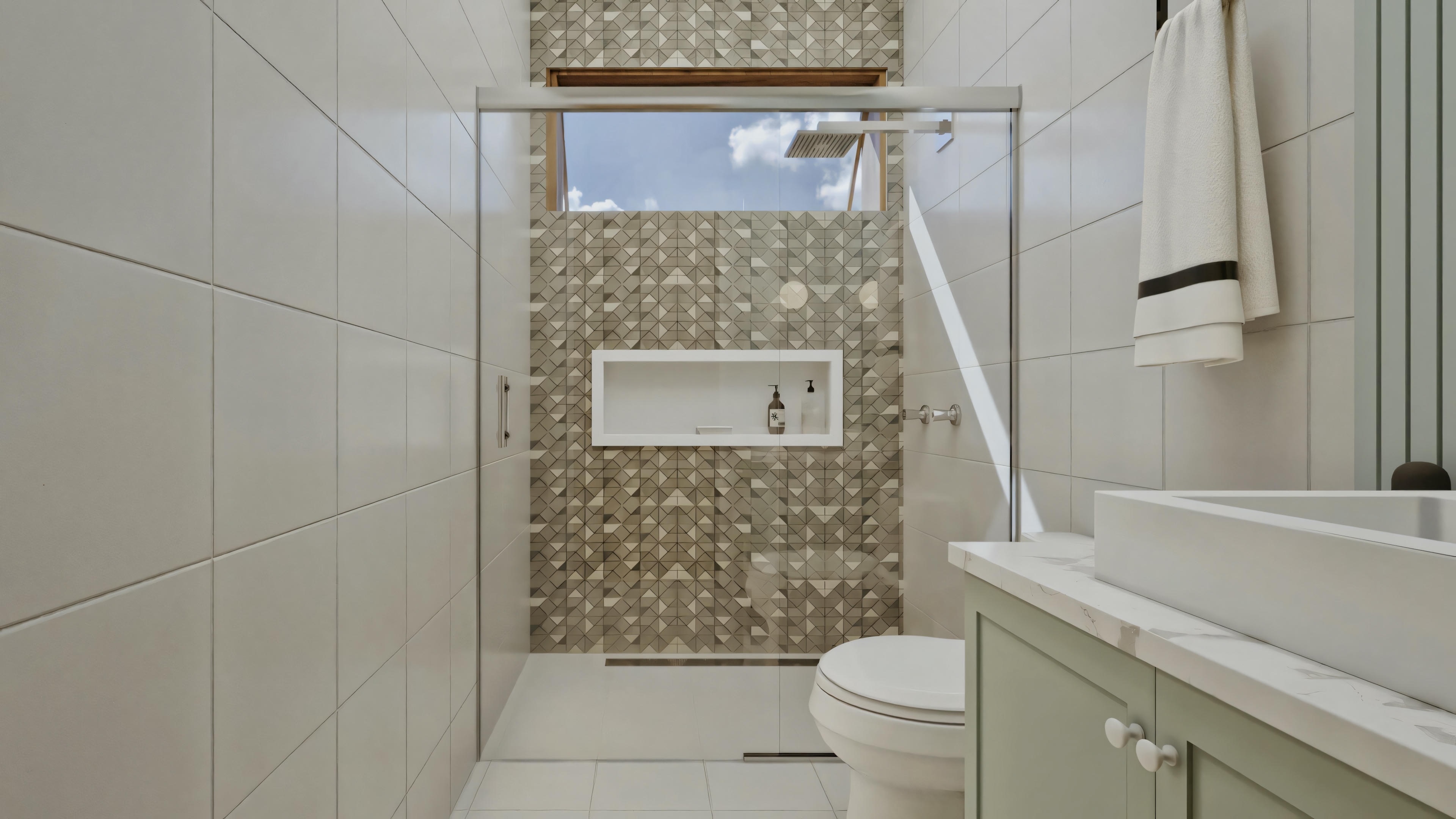 Another bathroom with a bathtub, sink with mirror, and lighting.