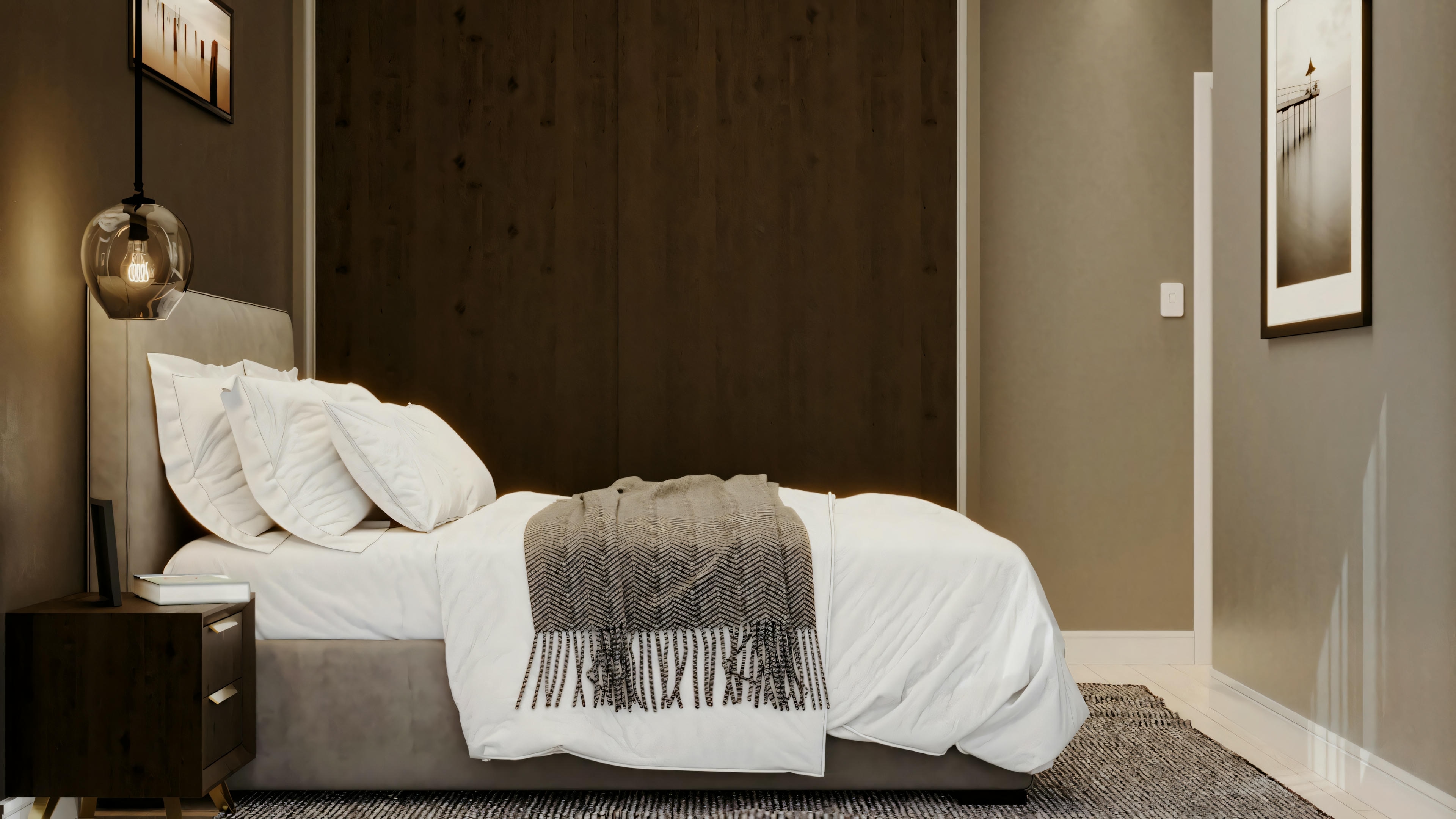 A bedroom with a bed covered in white linens, pillows, a nightstand with a lamp, and an upholstered headboard.
