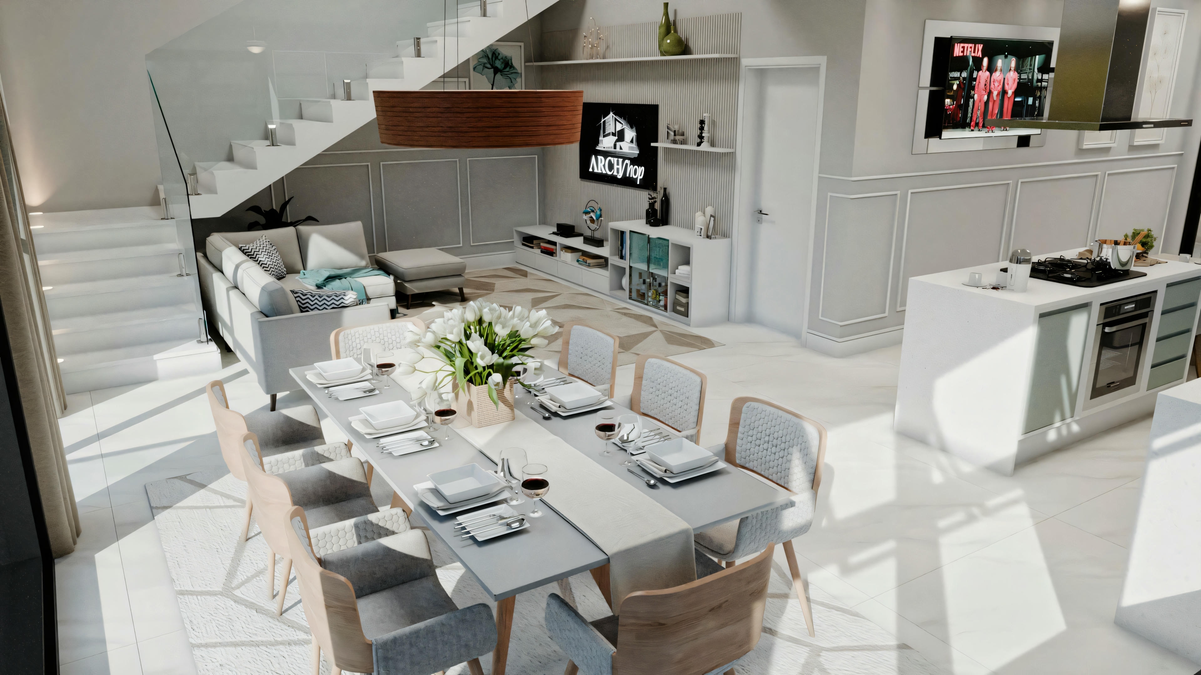 Cocina moderna con gabinetes blancos, mesa de comedor puesta para una comida con platos y vasos, y un diseño de planta abierta que conduce a una sala de estar.