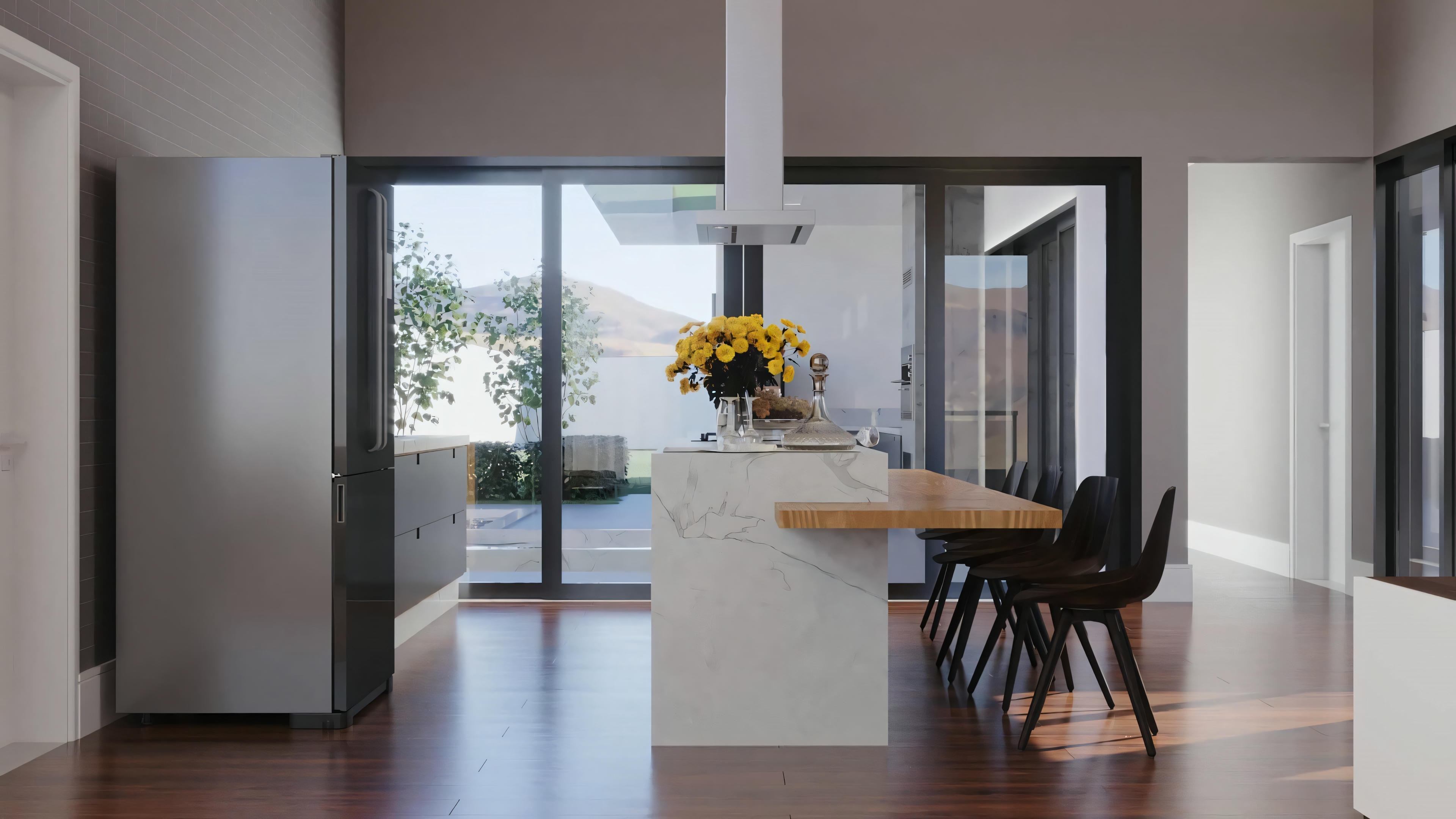 Comedor iluminado con mesa, sillas y un ramo de flores amarillas.