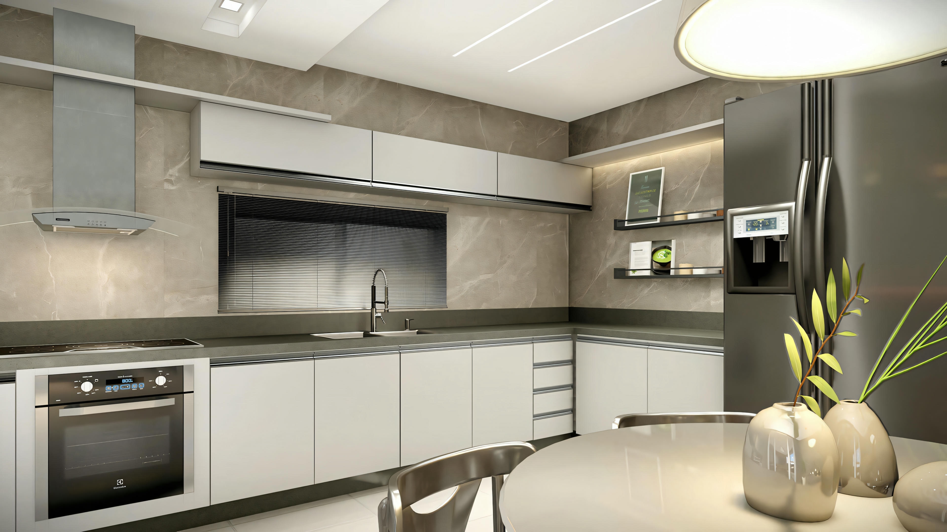 Cocina moderna con armarios grises, electrodomésticos de acero inoxidable, planta sobre la encimera e iluminación empotrada en el techo.