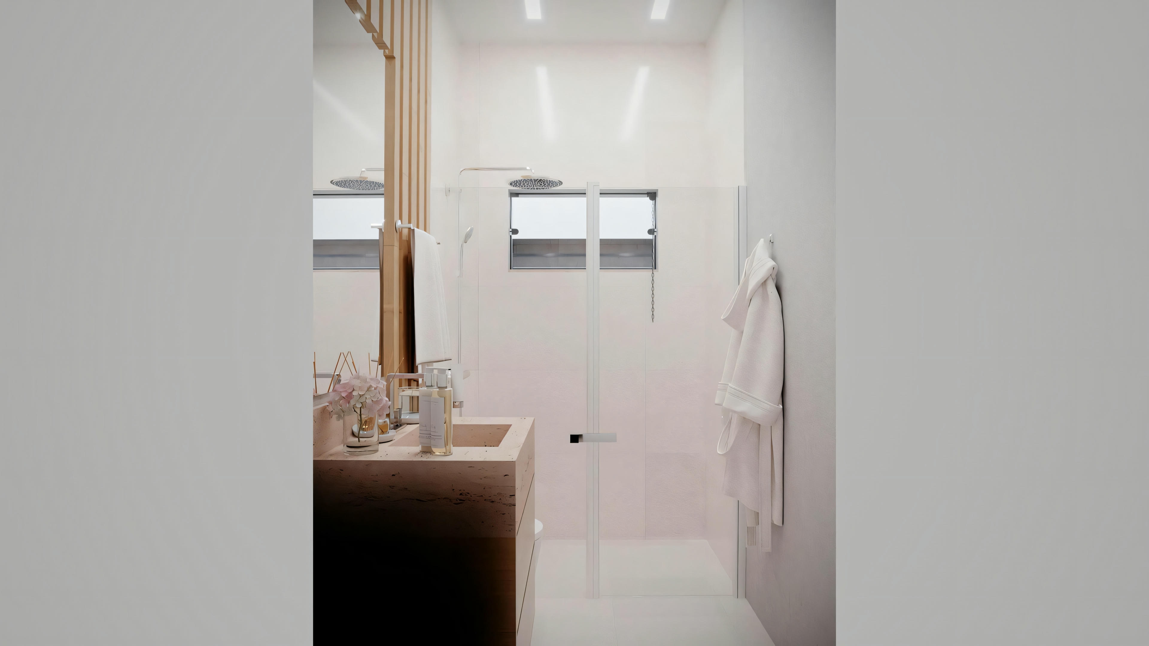 Entrance area with white walls and a black-framed mirror.