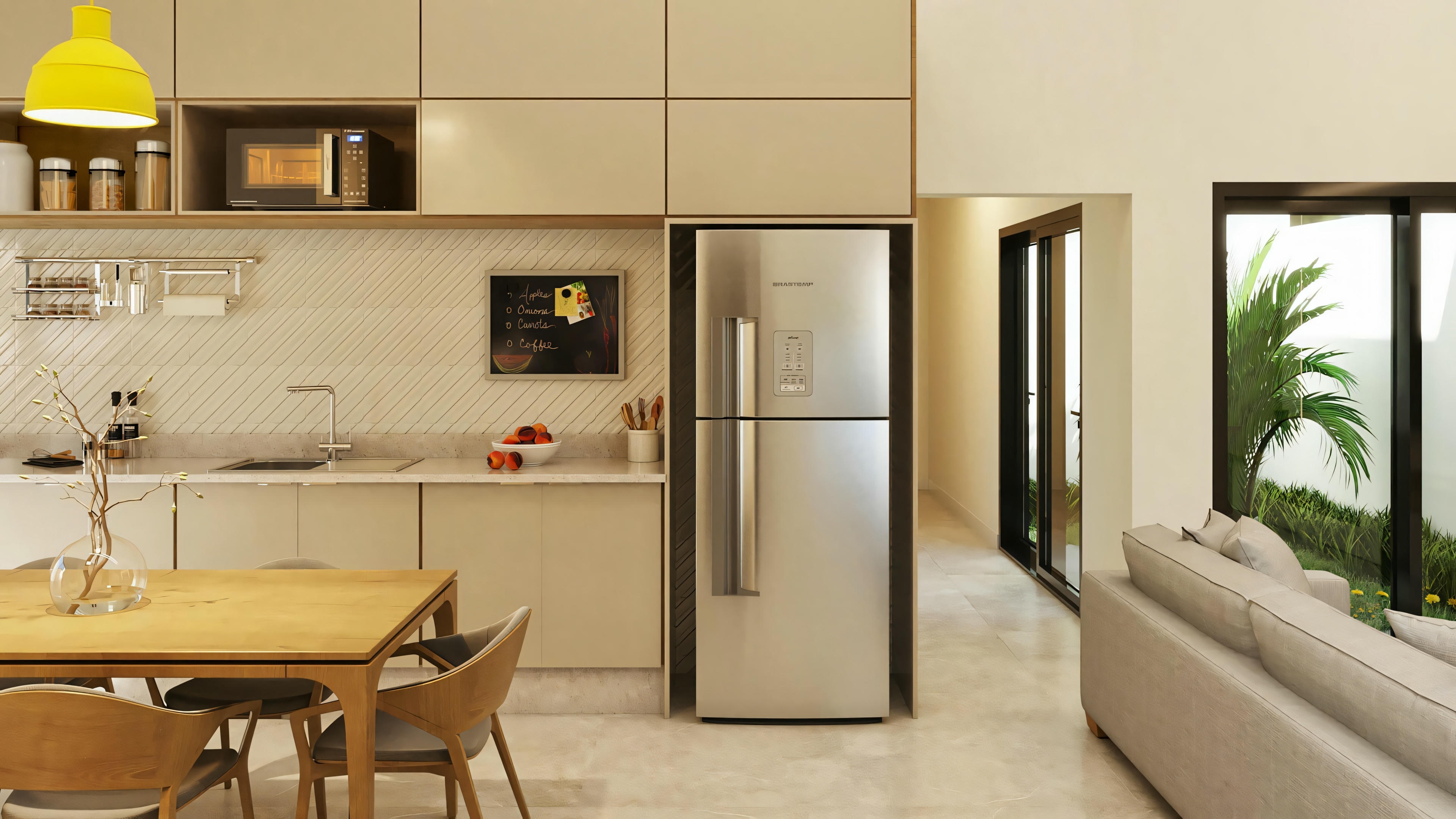 Modern kitchen with dining area, white cabinets, and stainless steel refrigerator.