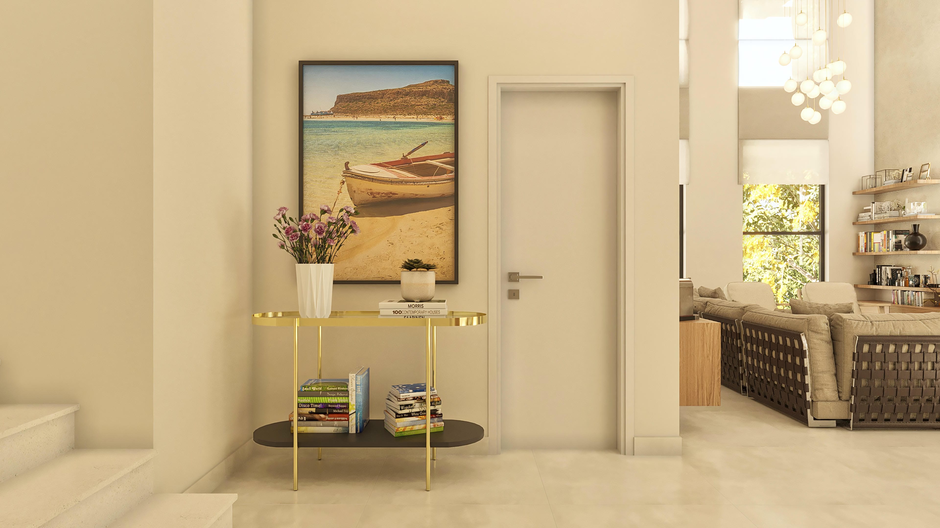 Internal detail of a modern two-story house with a light stone staircase, a golden console table with a floral arrangement and books, a neutral-toned door, and access to the living room with a cozy sofa and wooden bookshelf.