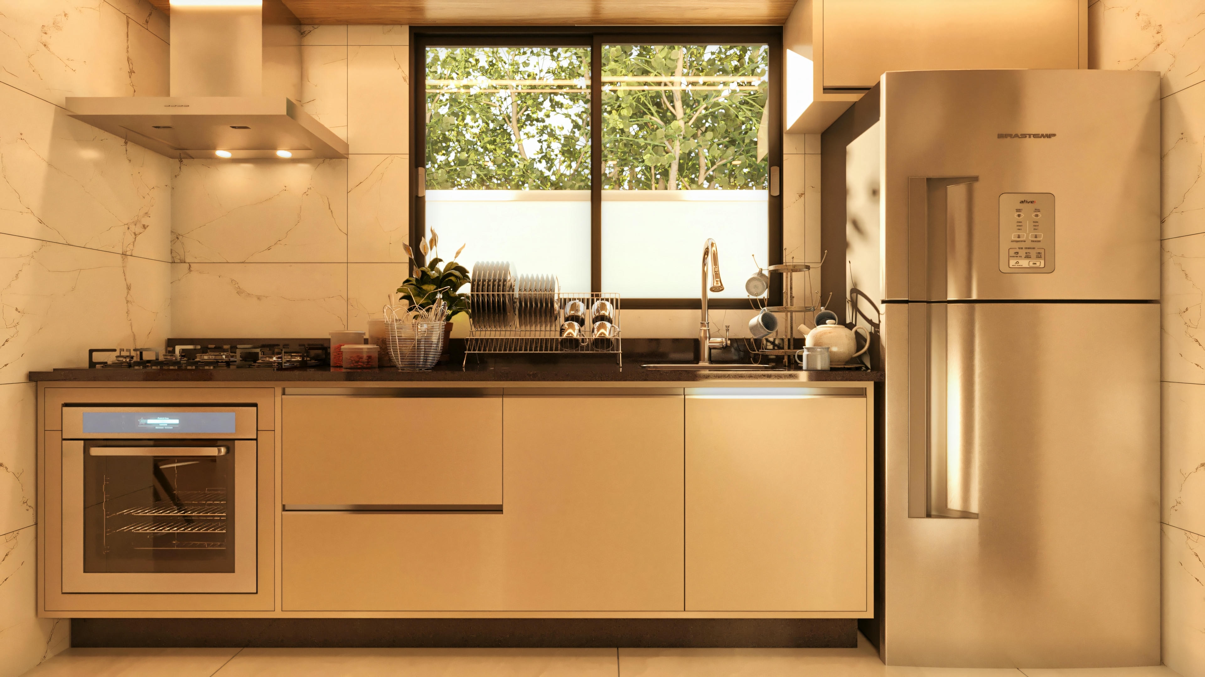 Detalle de la cocina moderna y equipada en una casa de 3 habitaciones y 2 suites. Horno empotrado, encimera, campana, frigorífico y armarios planeados.