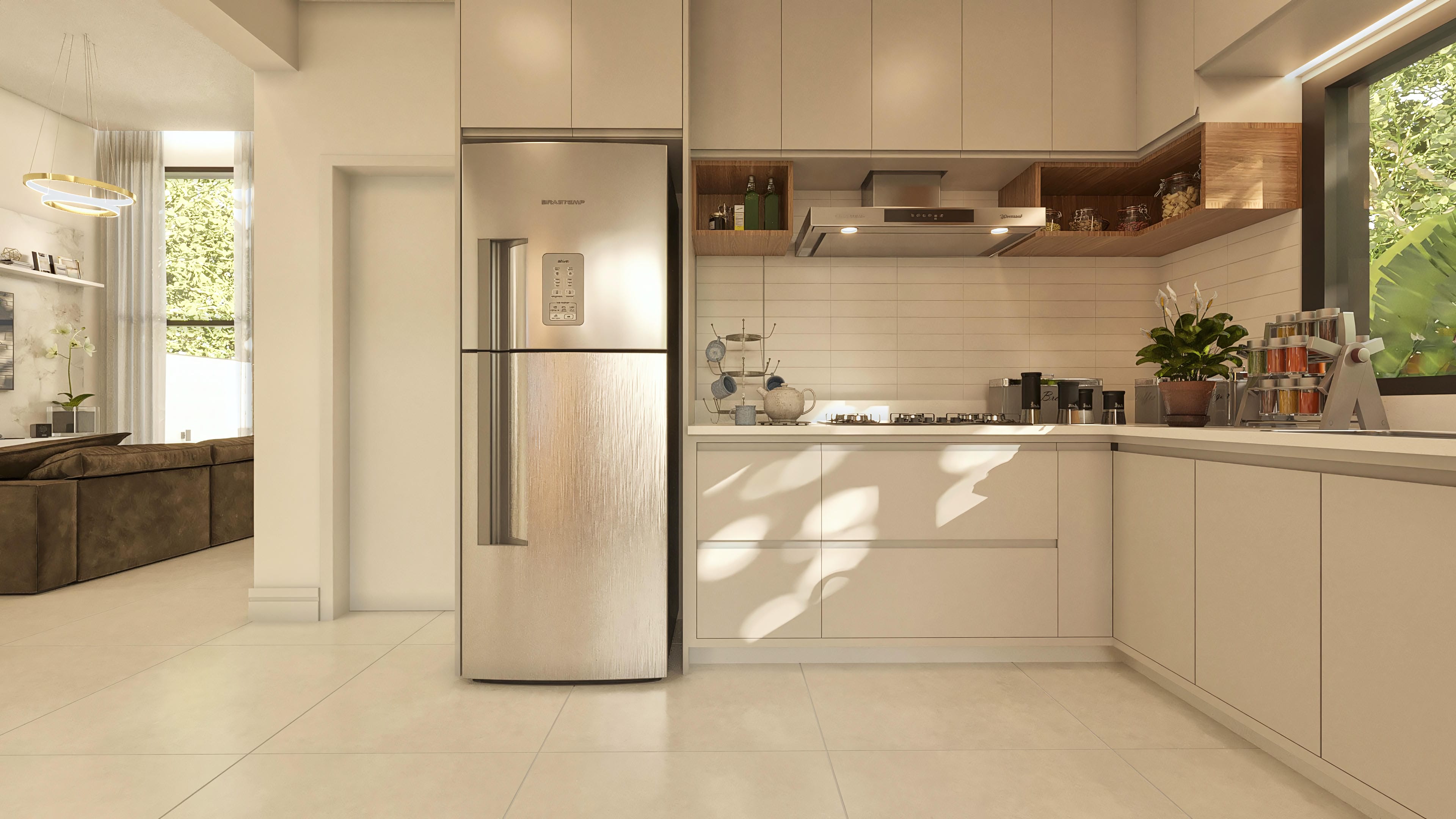 Cozinha moderna com armários claros, geladeira inox e bancada com cooktop. A iluminação natural realça os detalhes e a integração com o ambiente externo.