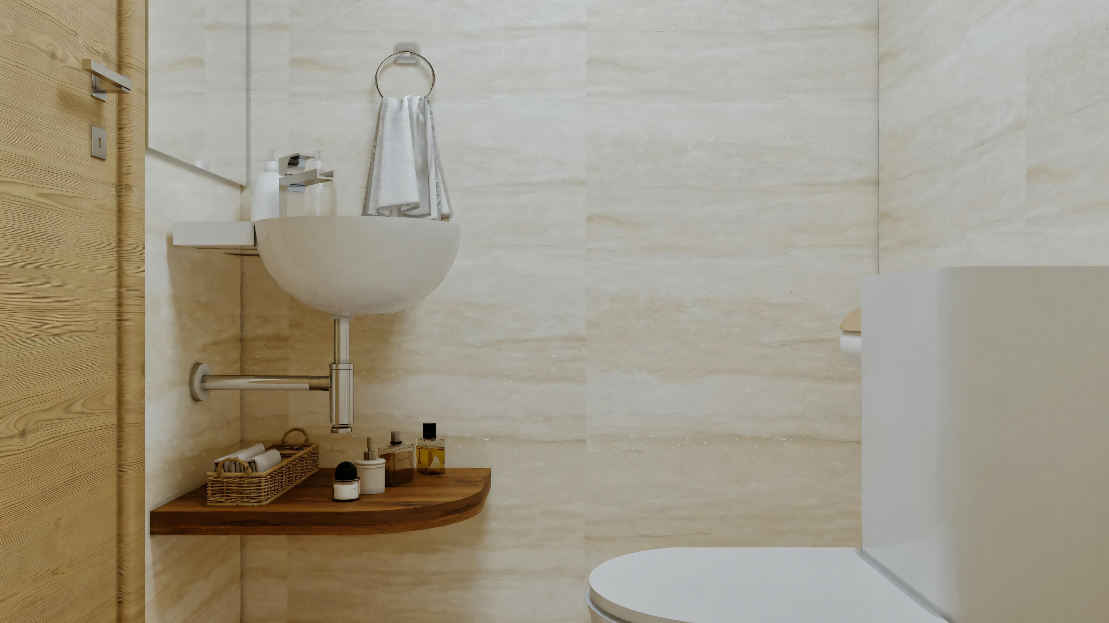 Un lavabo de pedestal blanco con un espejo encima y toallas al lado.
