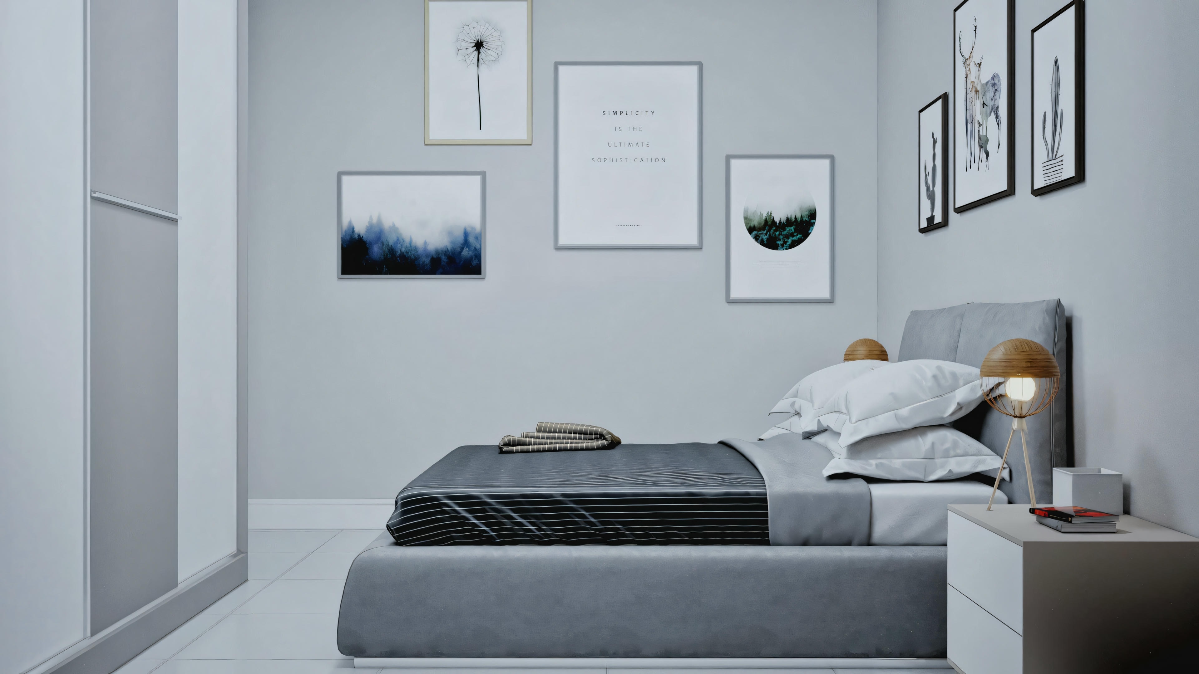 Quarto com tons neutros e obras de arte emolduradas na parede.