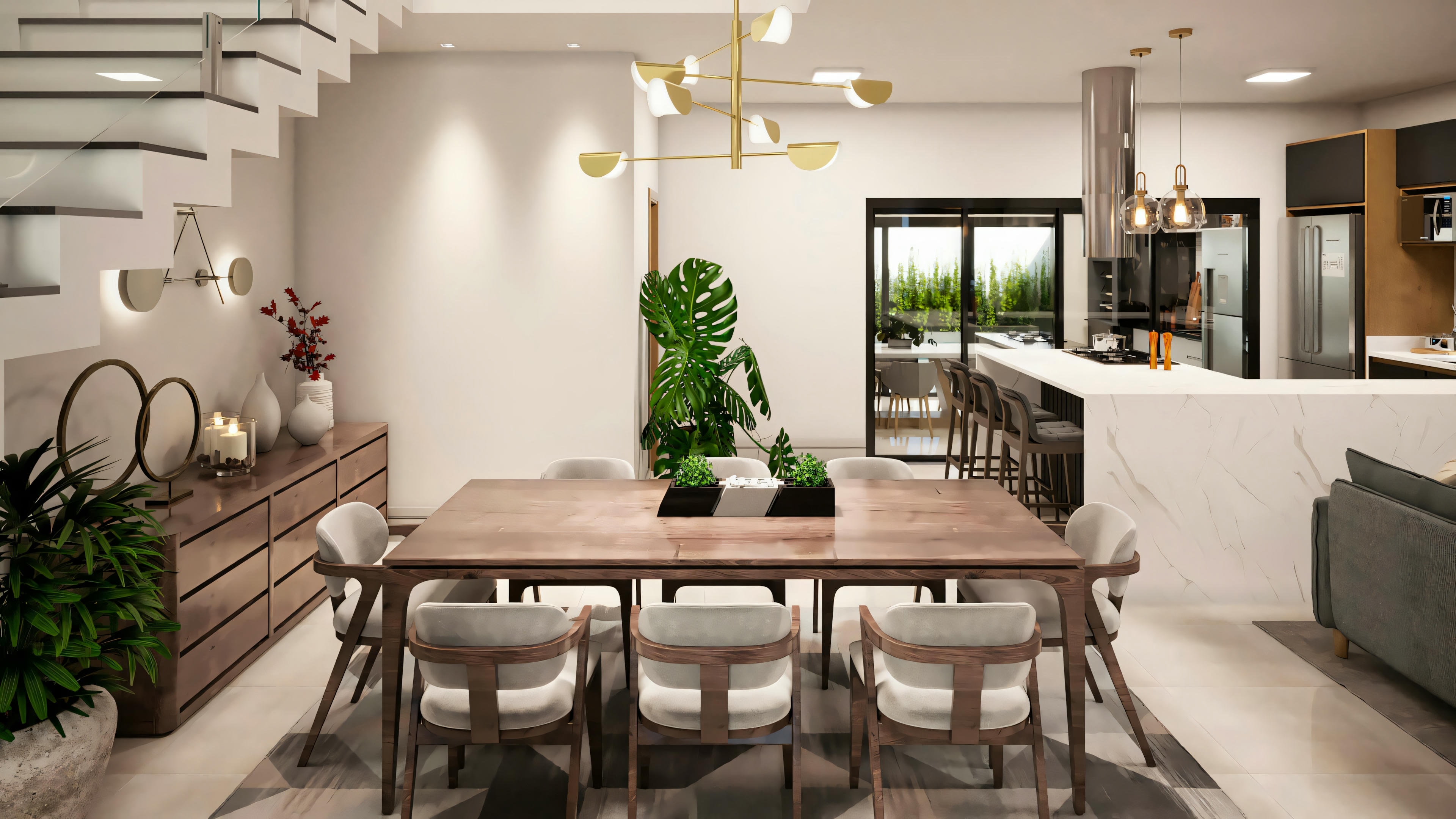 Área de comedor moderna adyacente a la cocina, con mesa grande y sillas, luminarias colgantes y plantas decorativas.