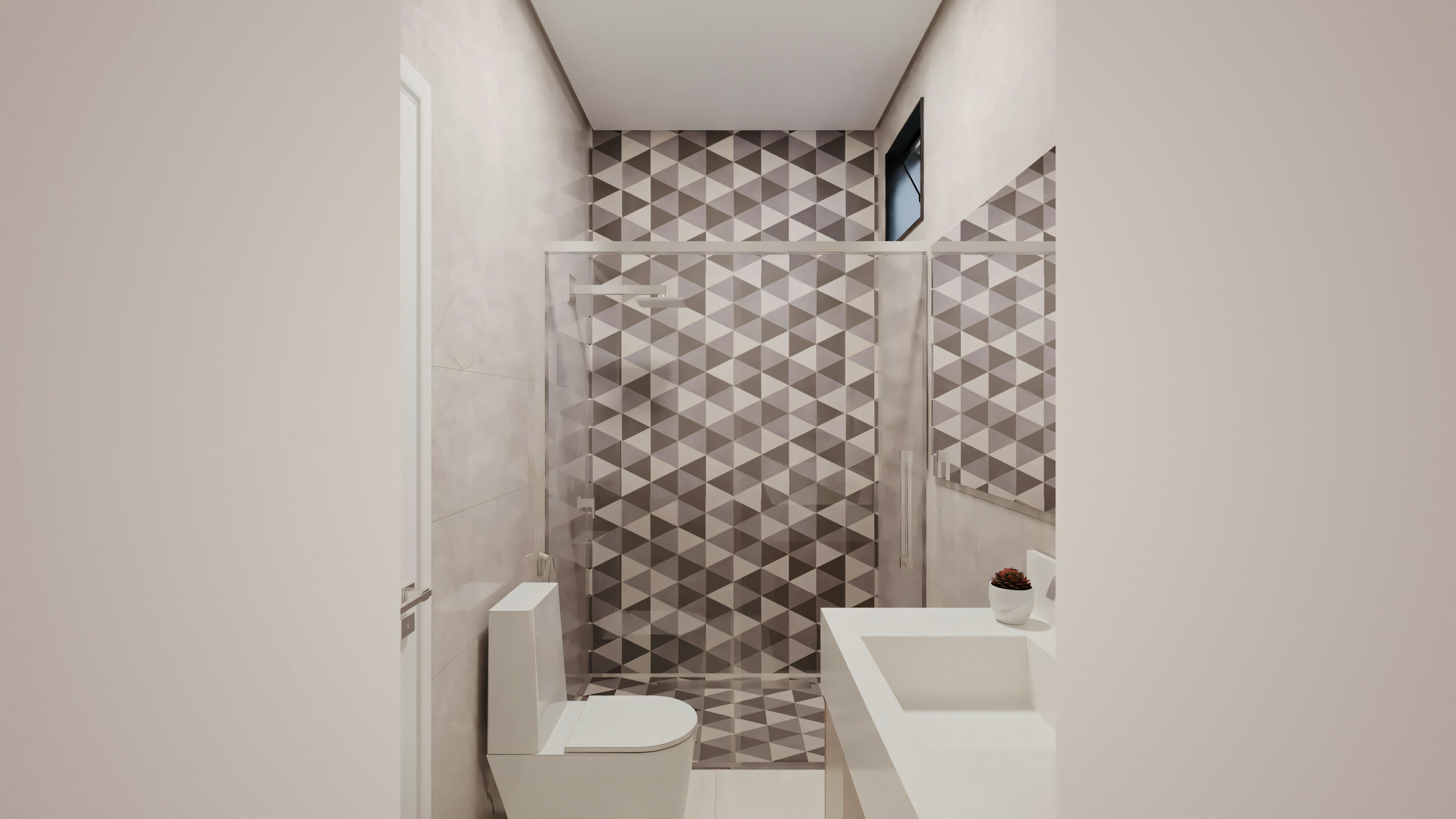 Um banheiro com louças brancas, incluindo um vaso sanitário e uma área de chuveiro com azulejos padronizados nas paredes.