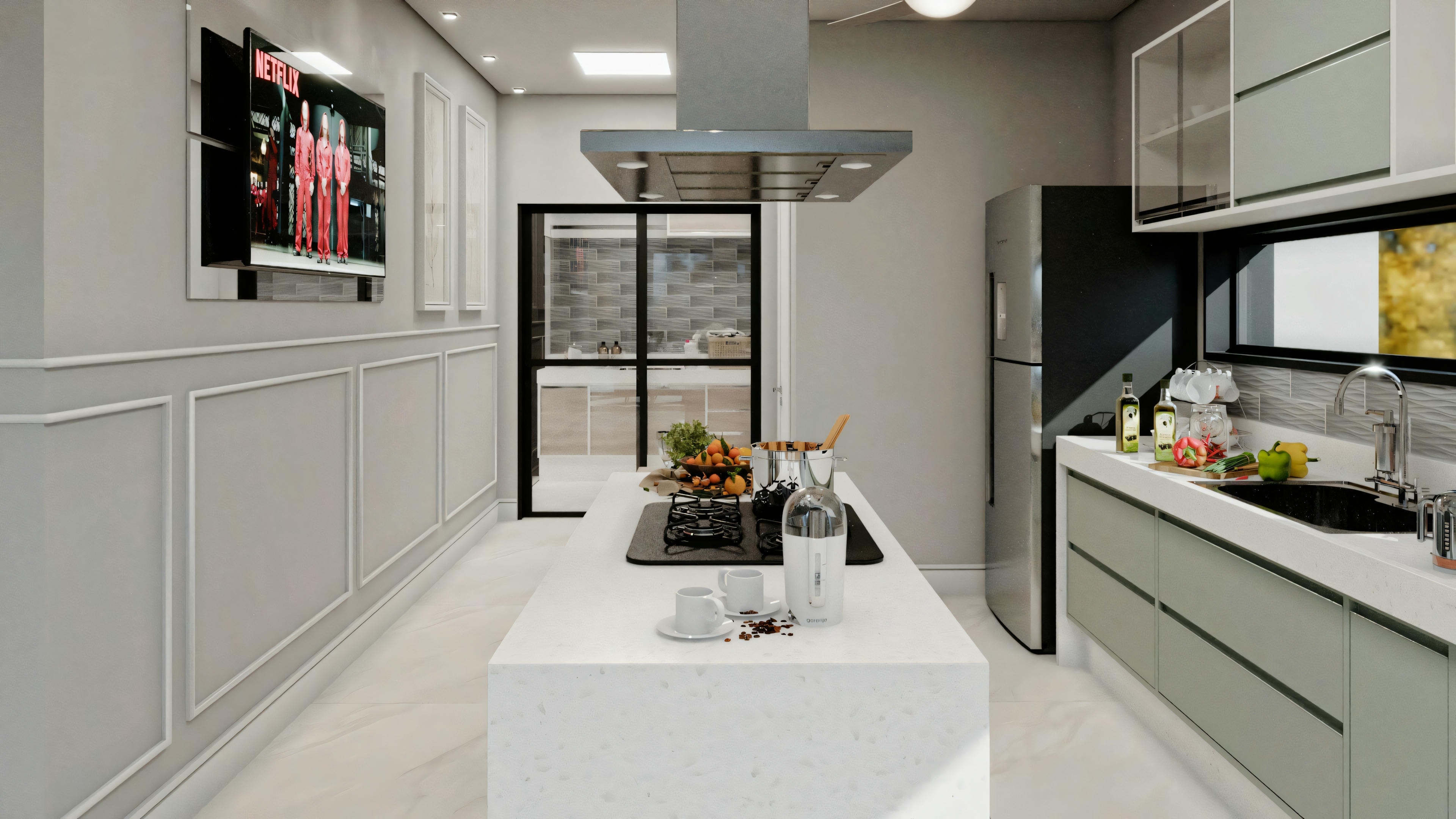 Cocina moderna con gabinetes grises, electrodomésticos de acero inoxidable, isla de cocina con un frutero y un cuadro en la pared.