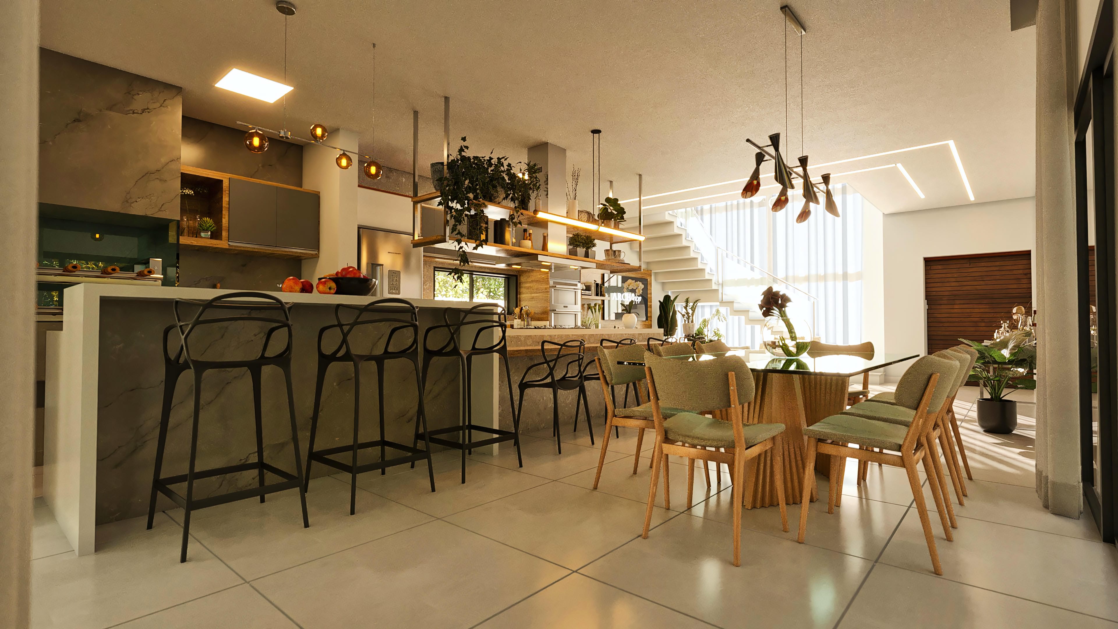 Integrated environment of a gourmet kitchen with a counter, dining room with table and chairs, and a modern staircase with built-in lighting.
