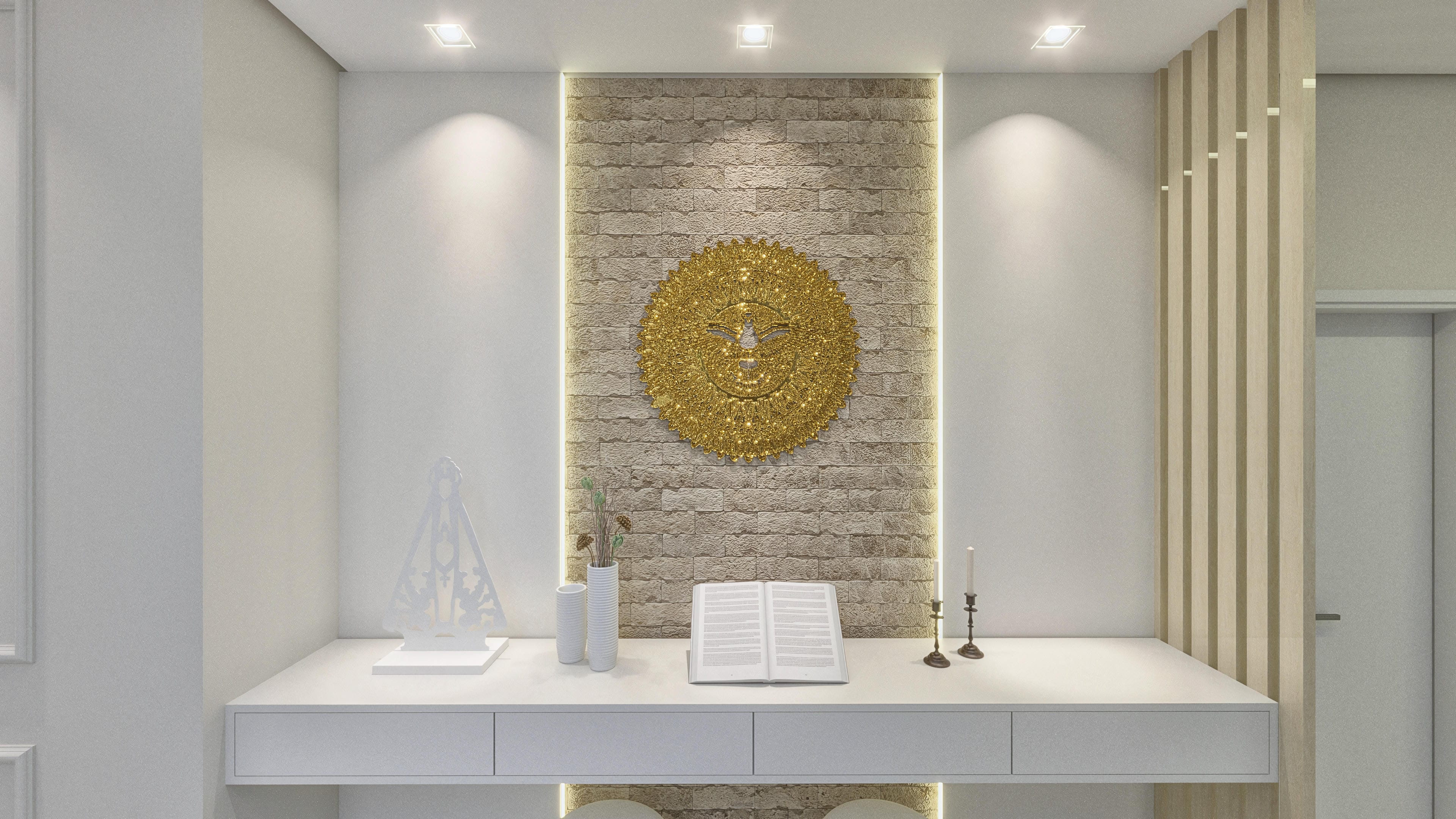 Detail of a wall niche with rustic stone cladding and indirect lighting, adorned with golden decorative elements and a religious statue.